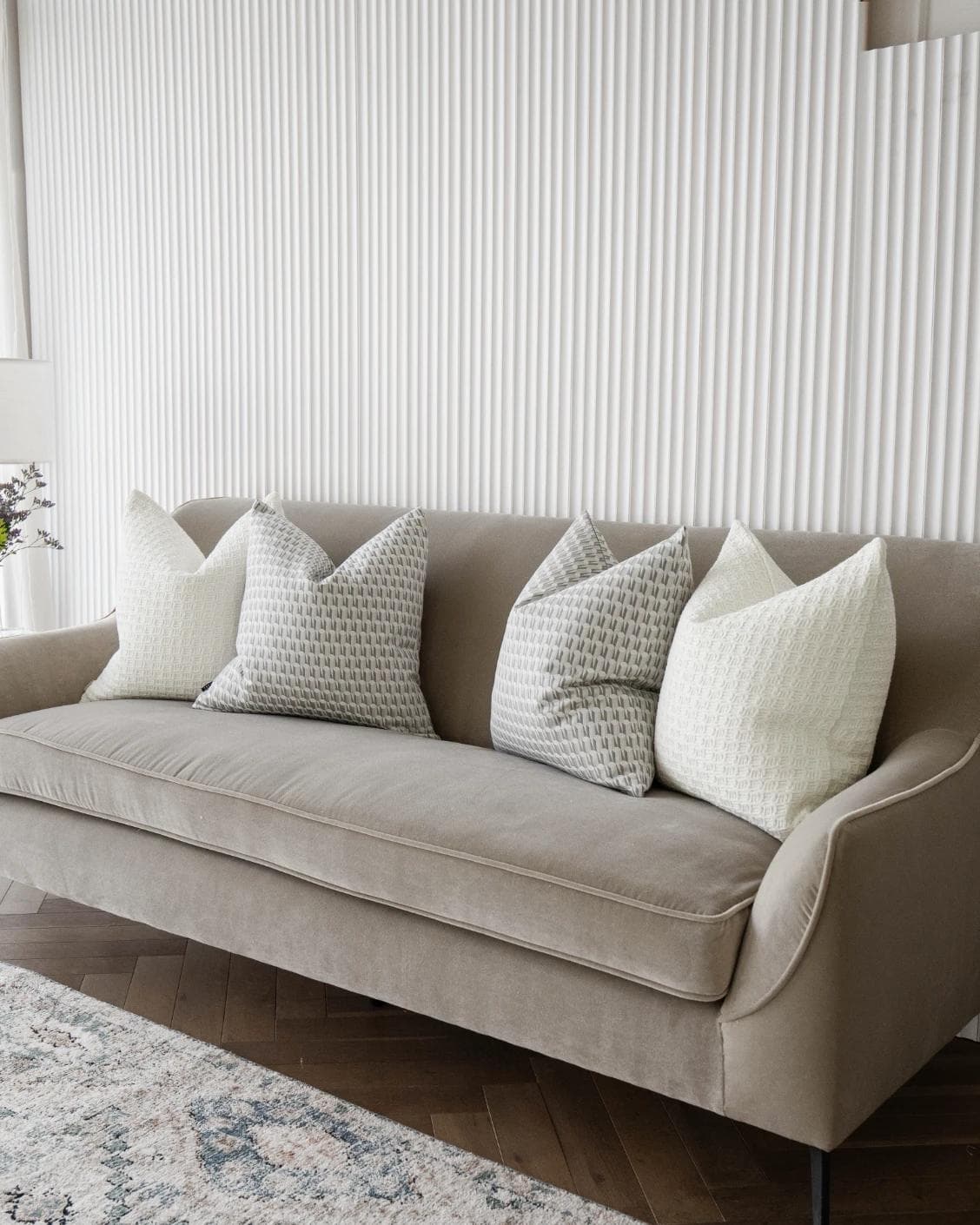 Therese Bundle cushion in white and silver, shown in a lifestyle right view as image 2