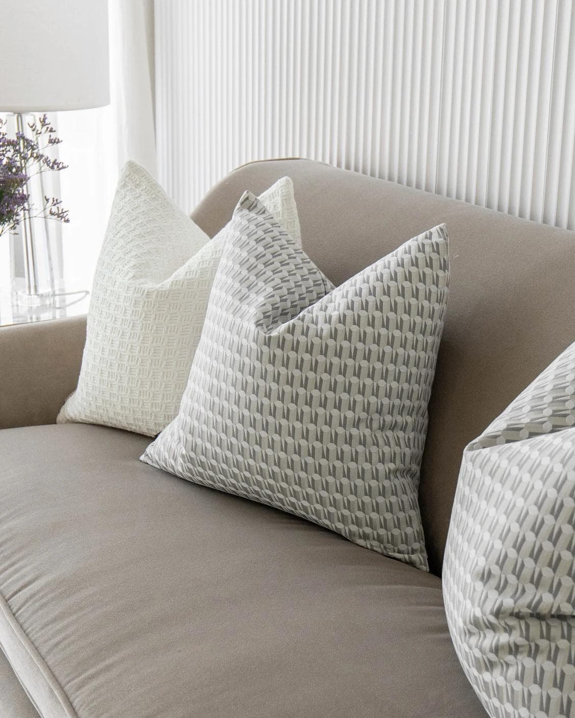 Therese Bundle cushion in white and silver, shown in a product right view as image 5