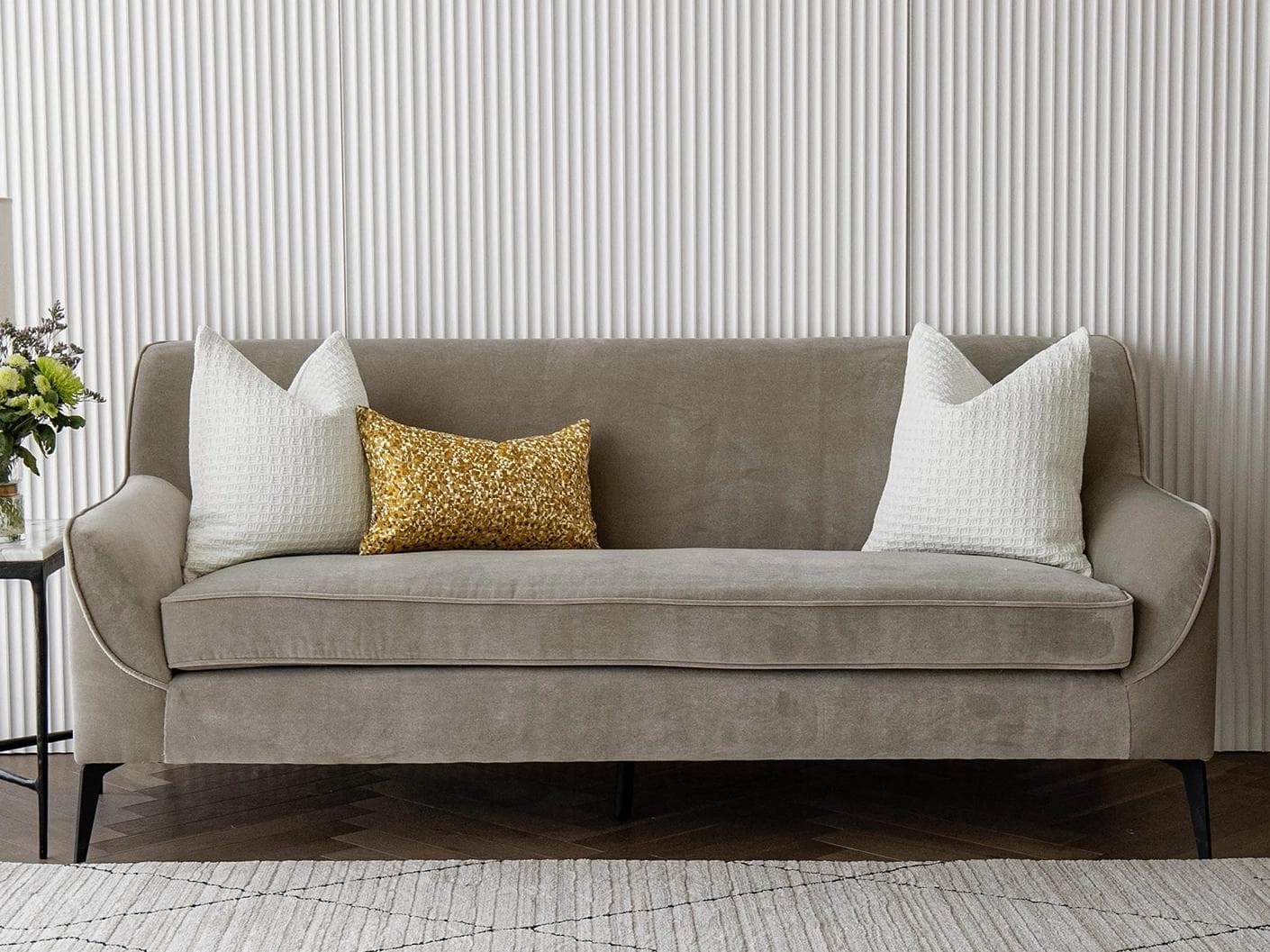 Maica Bundle cushion in white, gold and yellow, shown in a lifestyle front view as image 4