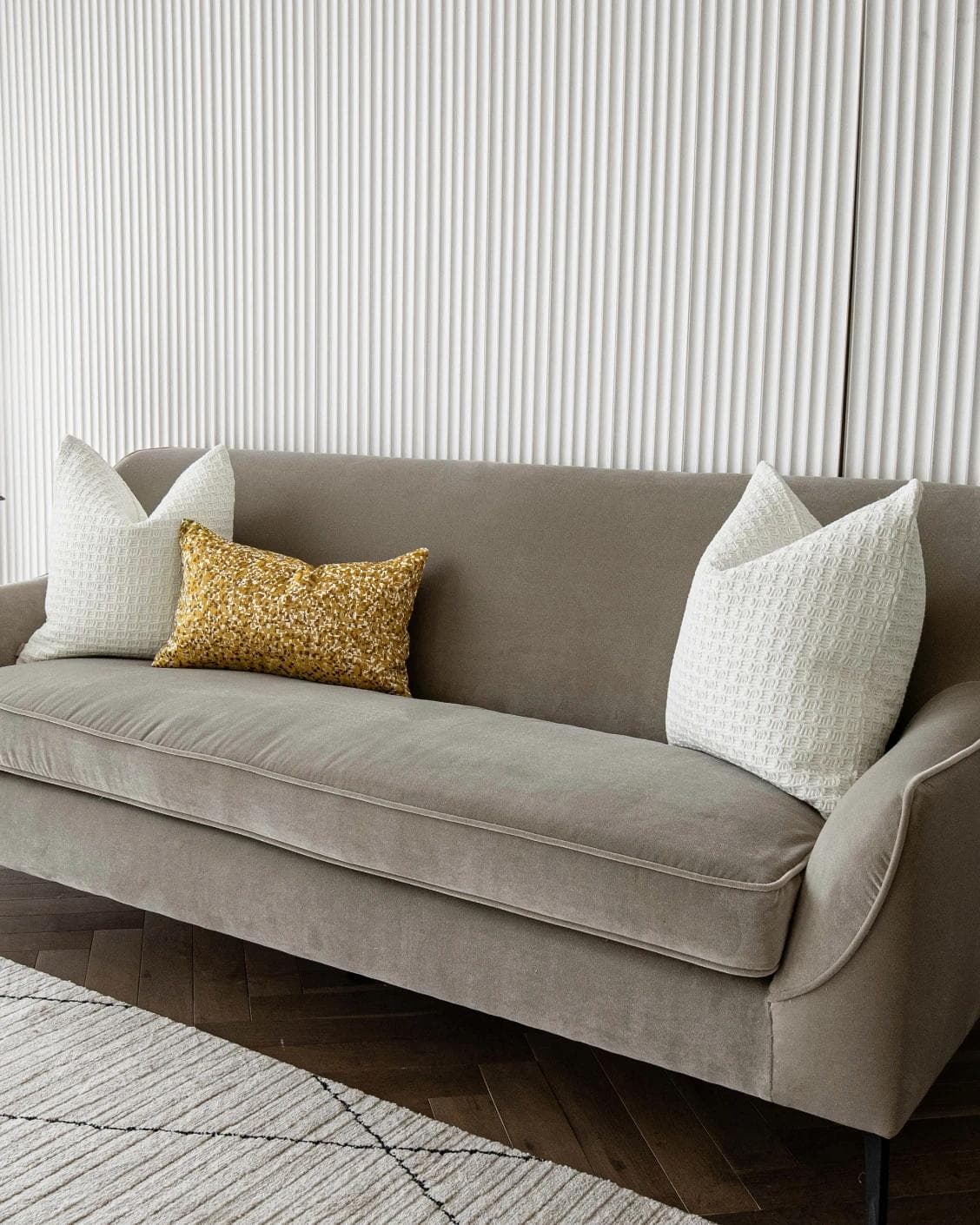 Maica Bundle cushion in white, gold and yellow, shown in a lifestyle right view as image 2