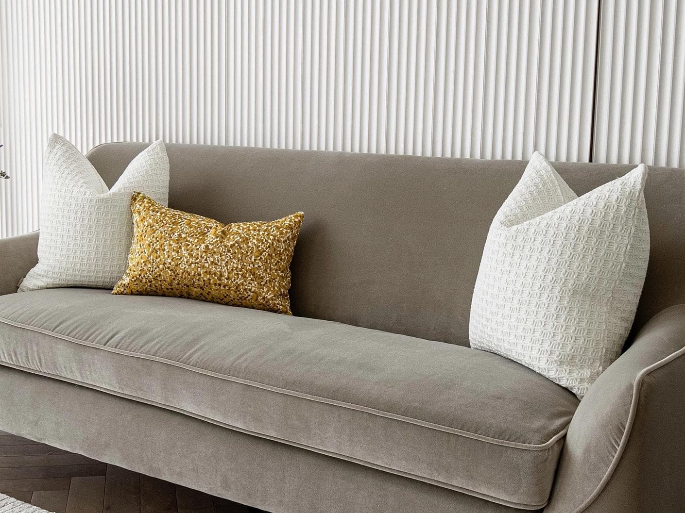 Maica Bundle cushion in white, gold and yellow, shown in a lifestyle right view as image 2