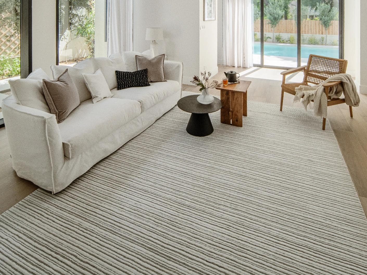 Theodore Dune carpets in grey and white, shown in a lifestyle front view as image 2
