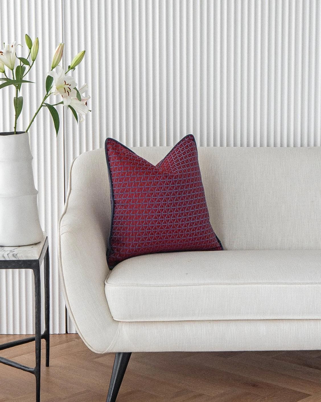 Thylane Canova I cushion in red and purple, shown in a lifestyle front view as image 4