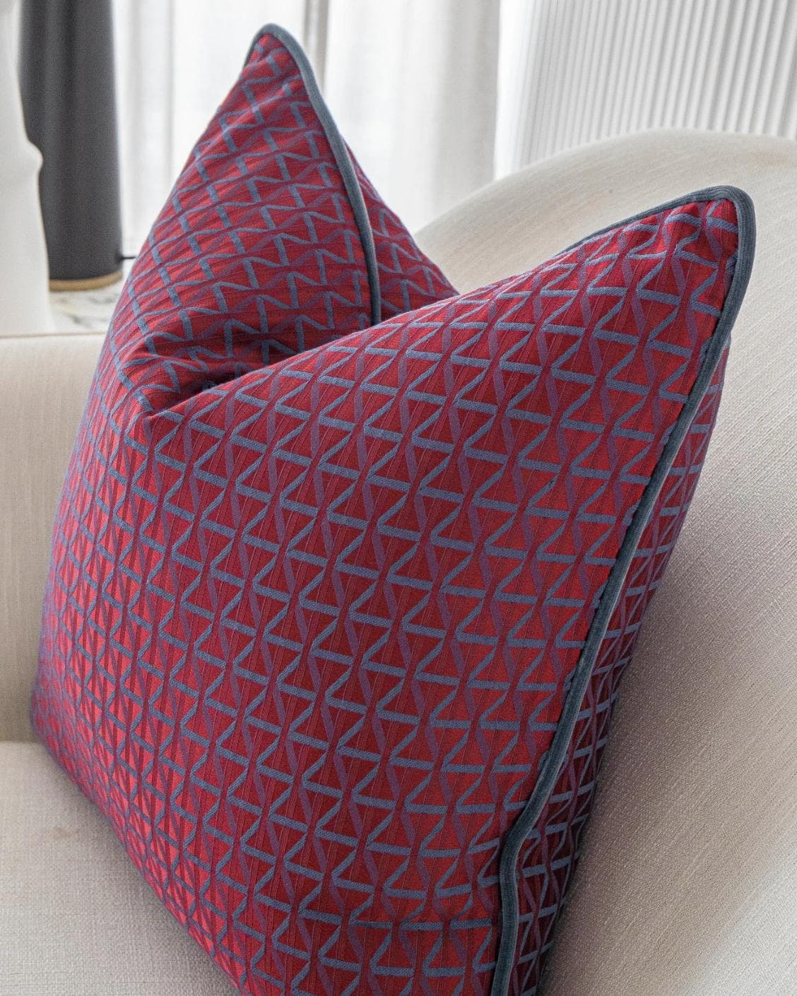 Thylane Canova I cushion in red and purple, shown in a lifestyle right view as image 5
