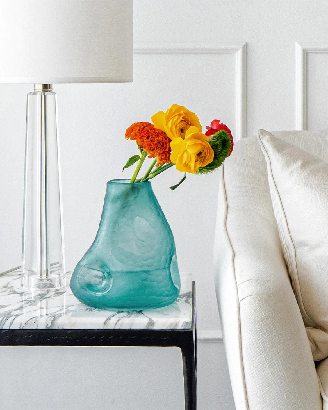 Tiffany Storms vases in turquoise, shown in a lifestyle front view as image 2