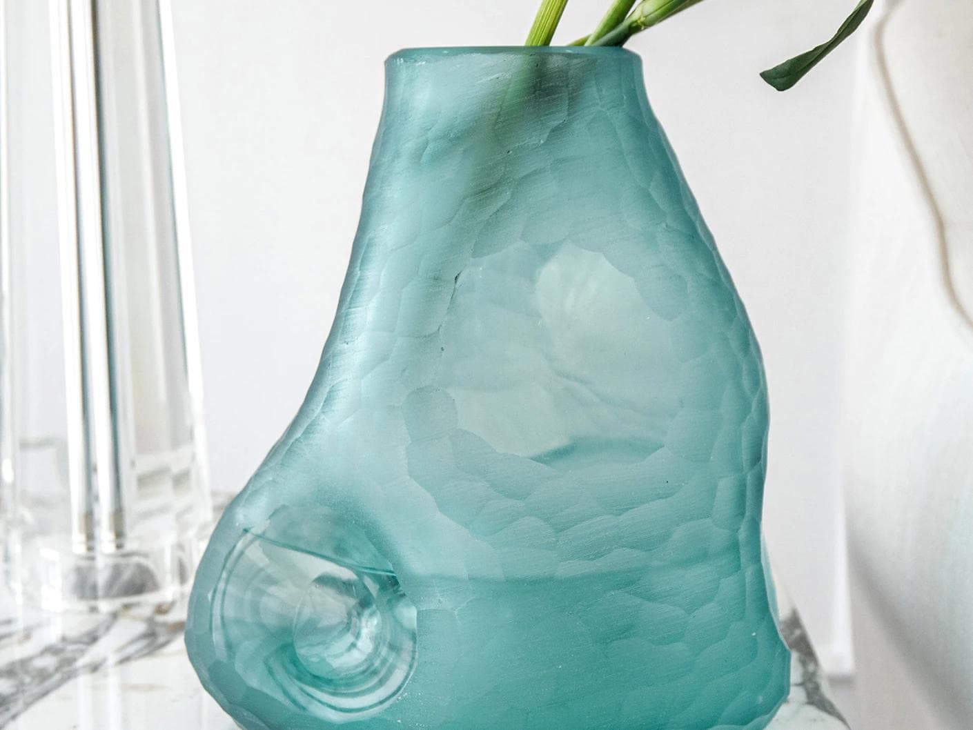Tiffany Storms vases in turquoise, shown in a lifestyle front view as image 4