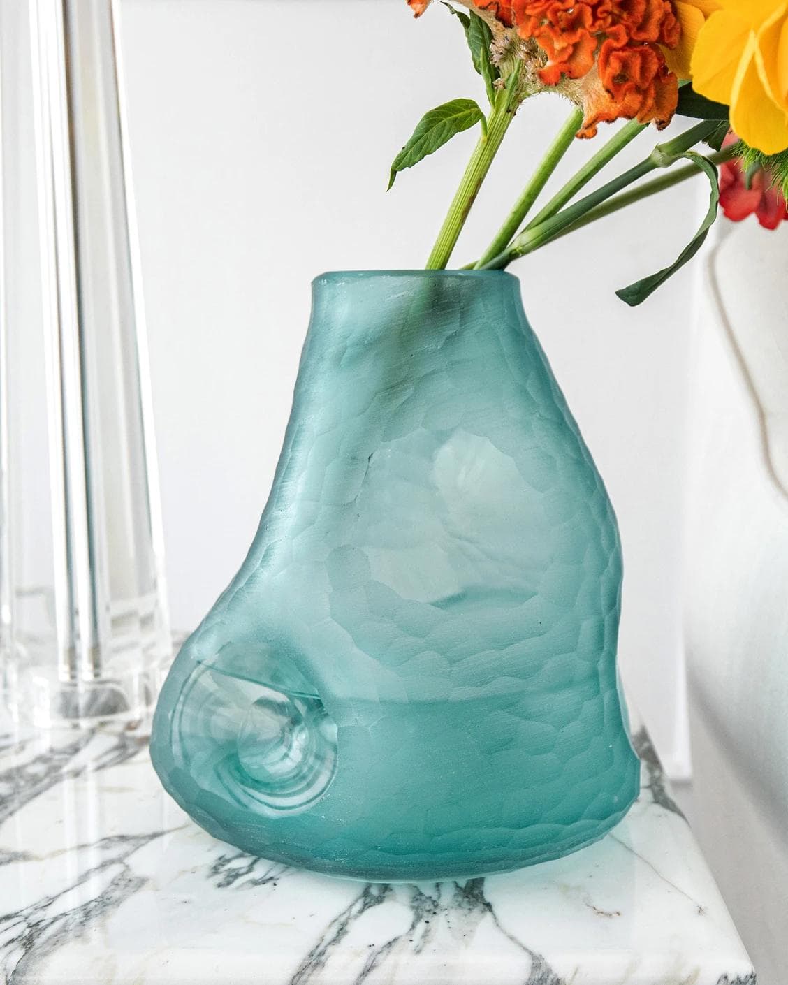 Tiffany Storms vases in turquoise, shown in a lifestyle front view as image 4