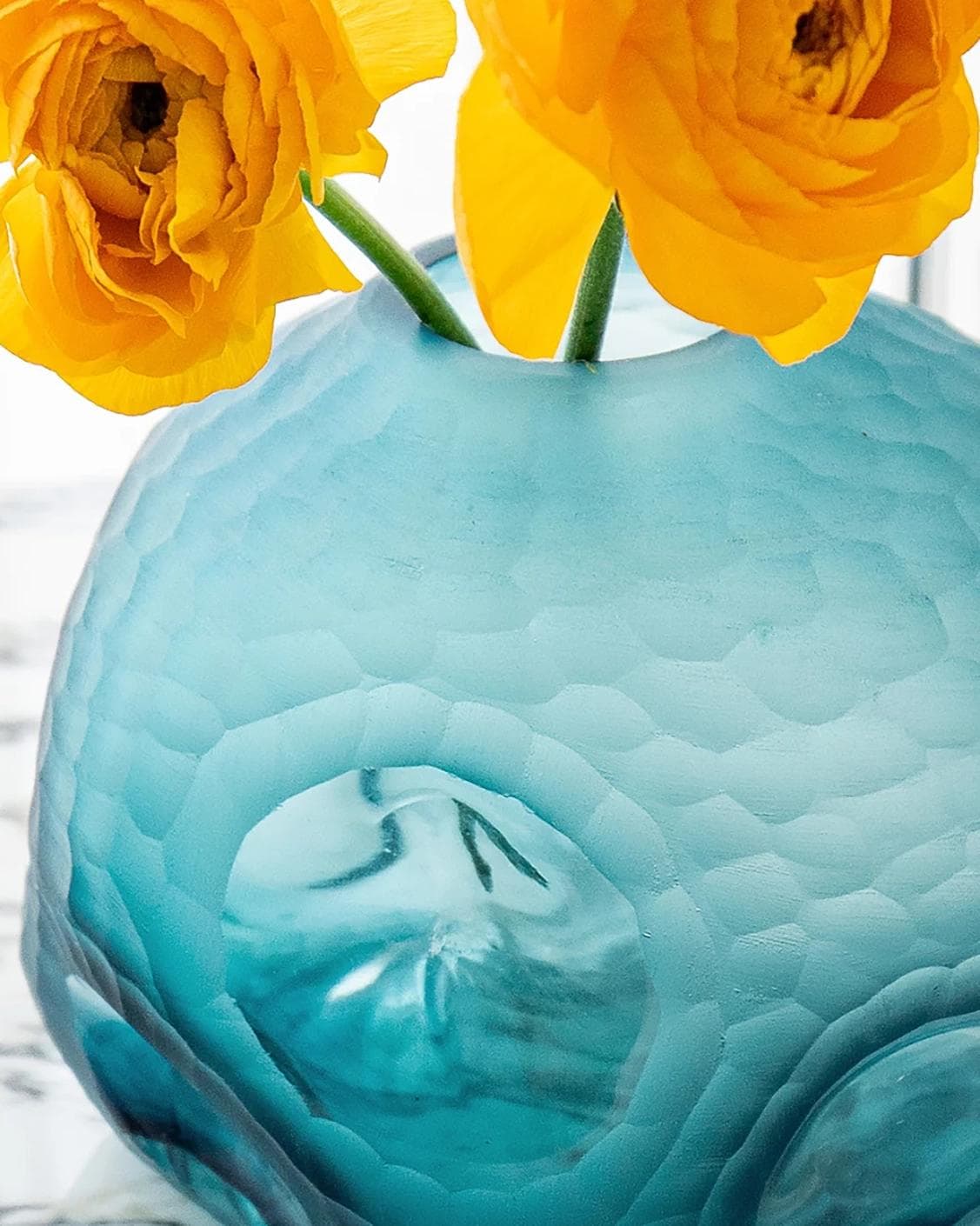 Tiffany Storms II vases in turquoise, shown in a lifestyle front view as image 2