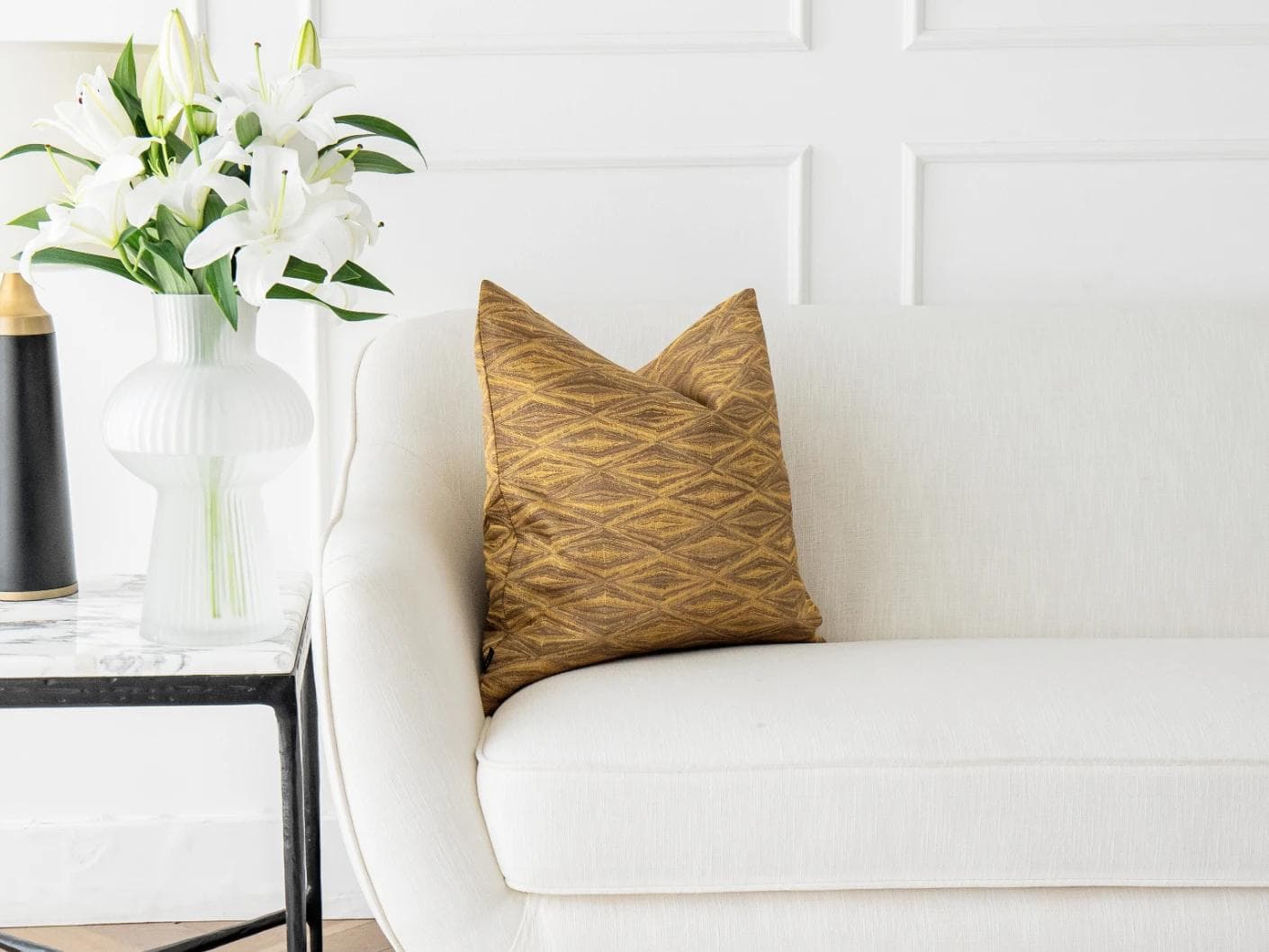 Titus Hodler cushion in yellow, shown in a lifestyle front view as image 4