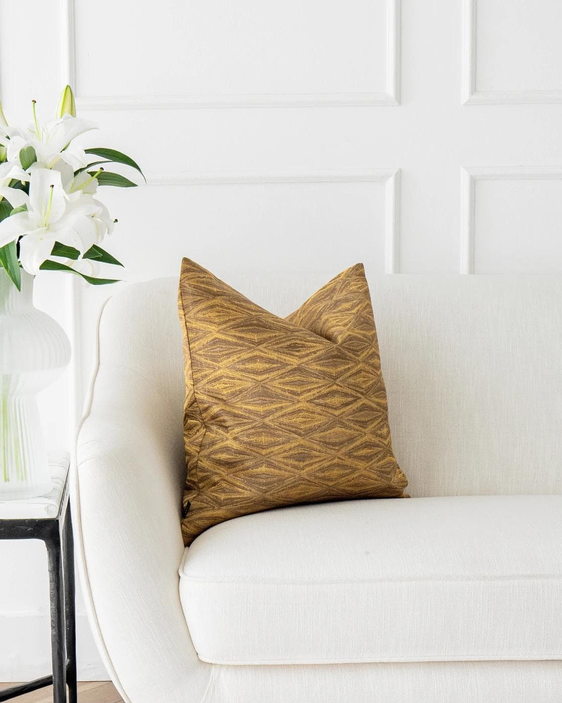 Titus Hodler cushion in yellow, shown in a lifestyle front view as image 4