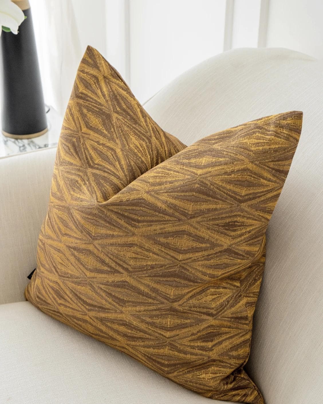 Titus Hodler cushion in yellow, shown in a lifestyle top view as image 5