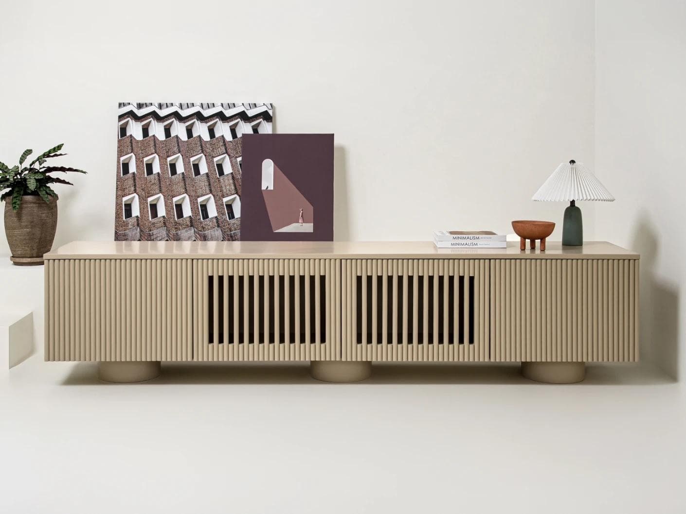 Treviso TV unit in warm clay and taupe, shown in a lifestyle front view as image 2