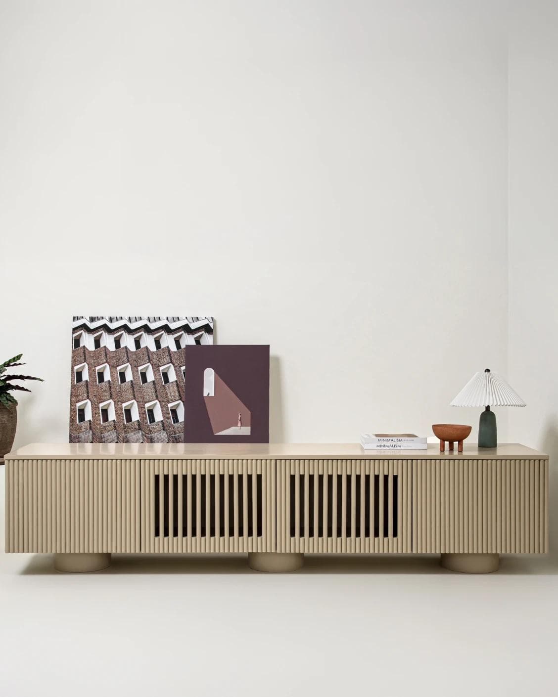 Treviso TV unit in warm clay and taupe, shown in a lifestyle front view as image 2