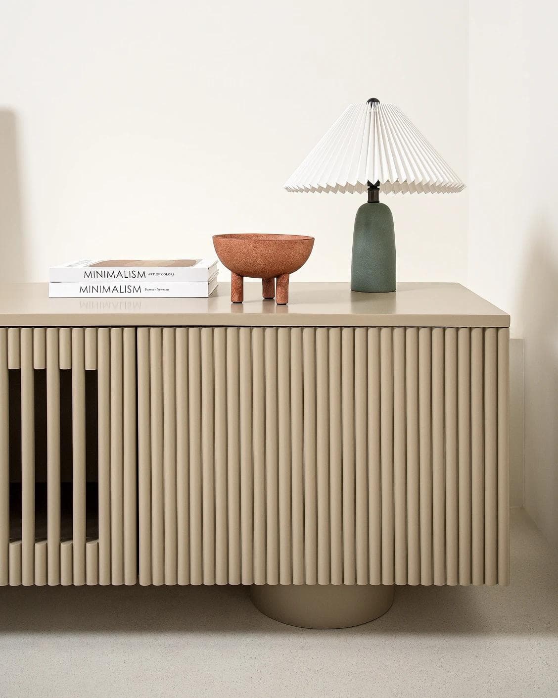 Treviso TV unit in warm clay and taupe, shown in a lifestyle front view as image 6
