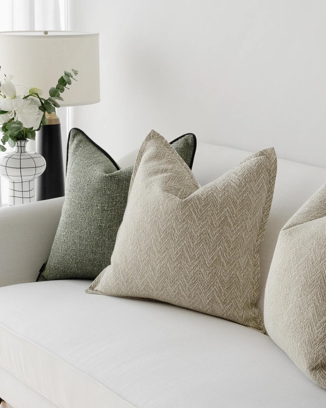 Trish Bundle cushion in beige and green, shown in a lifestyle right view as image 5
