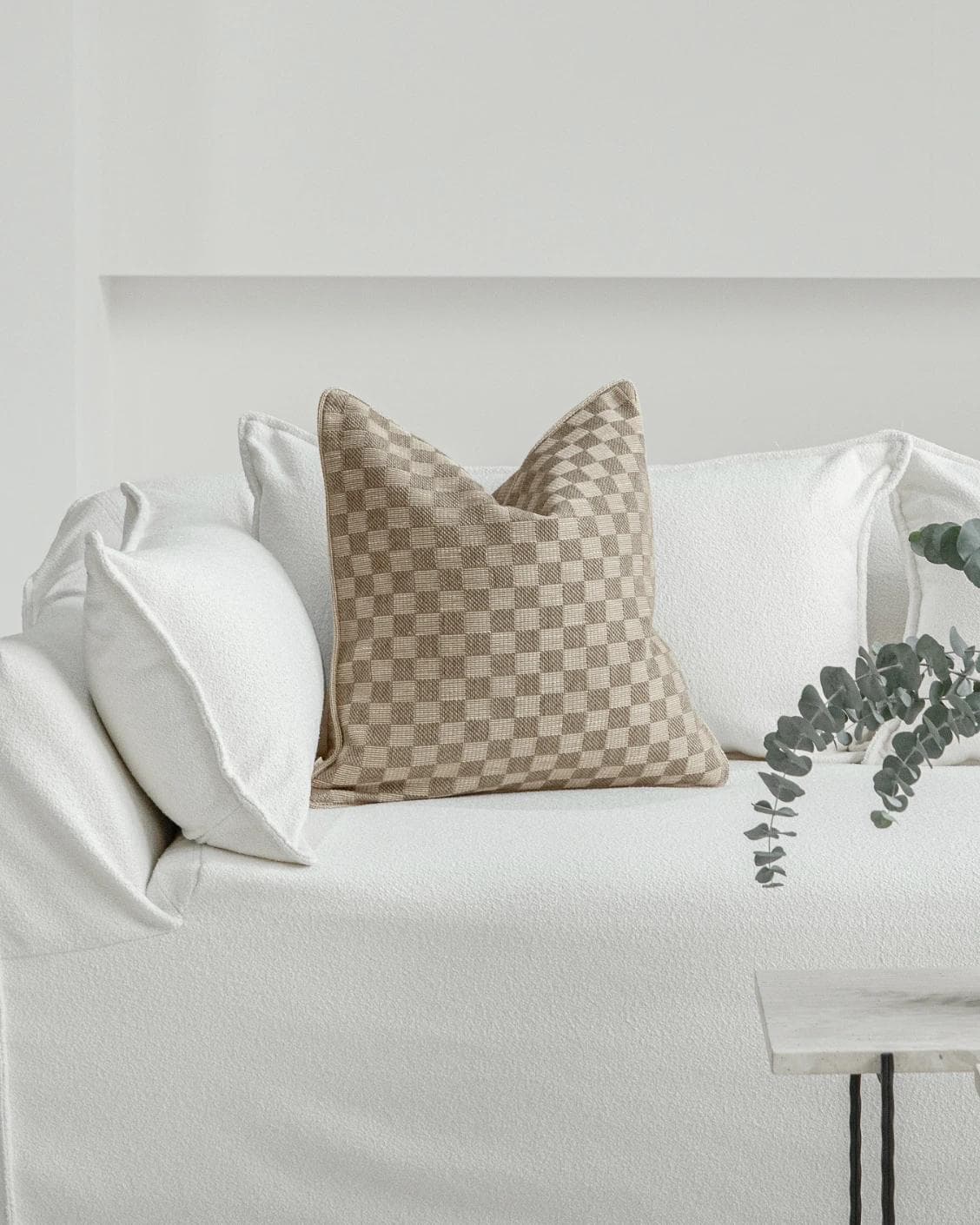 Troi Klimt cushion in taupe and beige, shown in a lifestyle front view as image 4