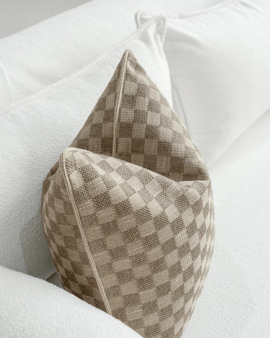 Troi Klimt cushion in taupe and beige, shown in a lifestyle top view as image 5