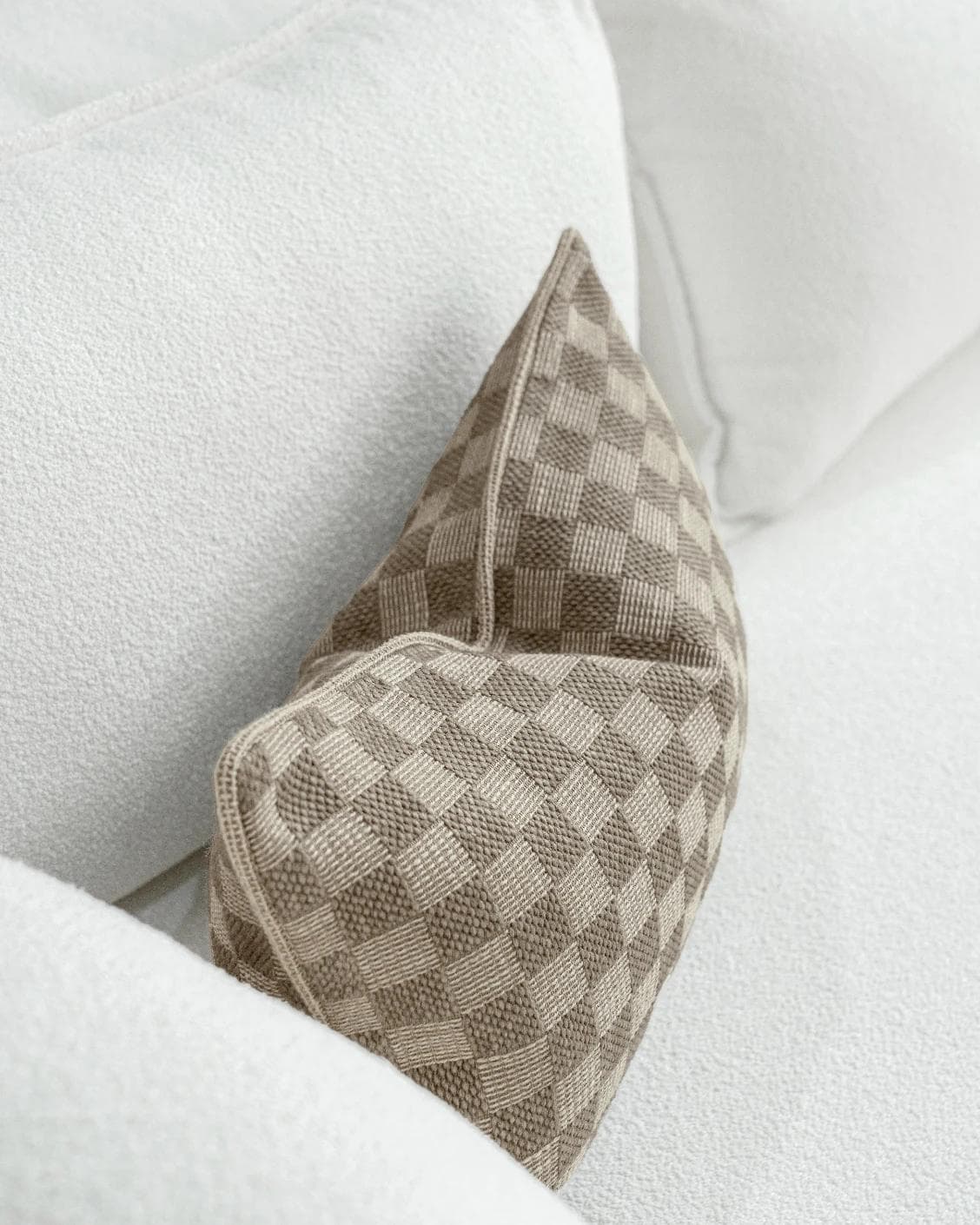 Troi Klimt II cushion in taupe and beige, shown in a lifestyle top view as image 5
