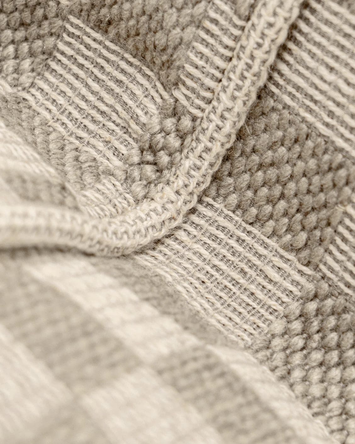 Troi Klimt II cushion in taupe and beige, shown in a product close-up as image 7