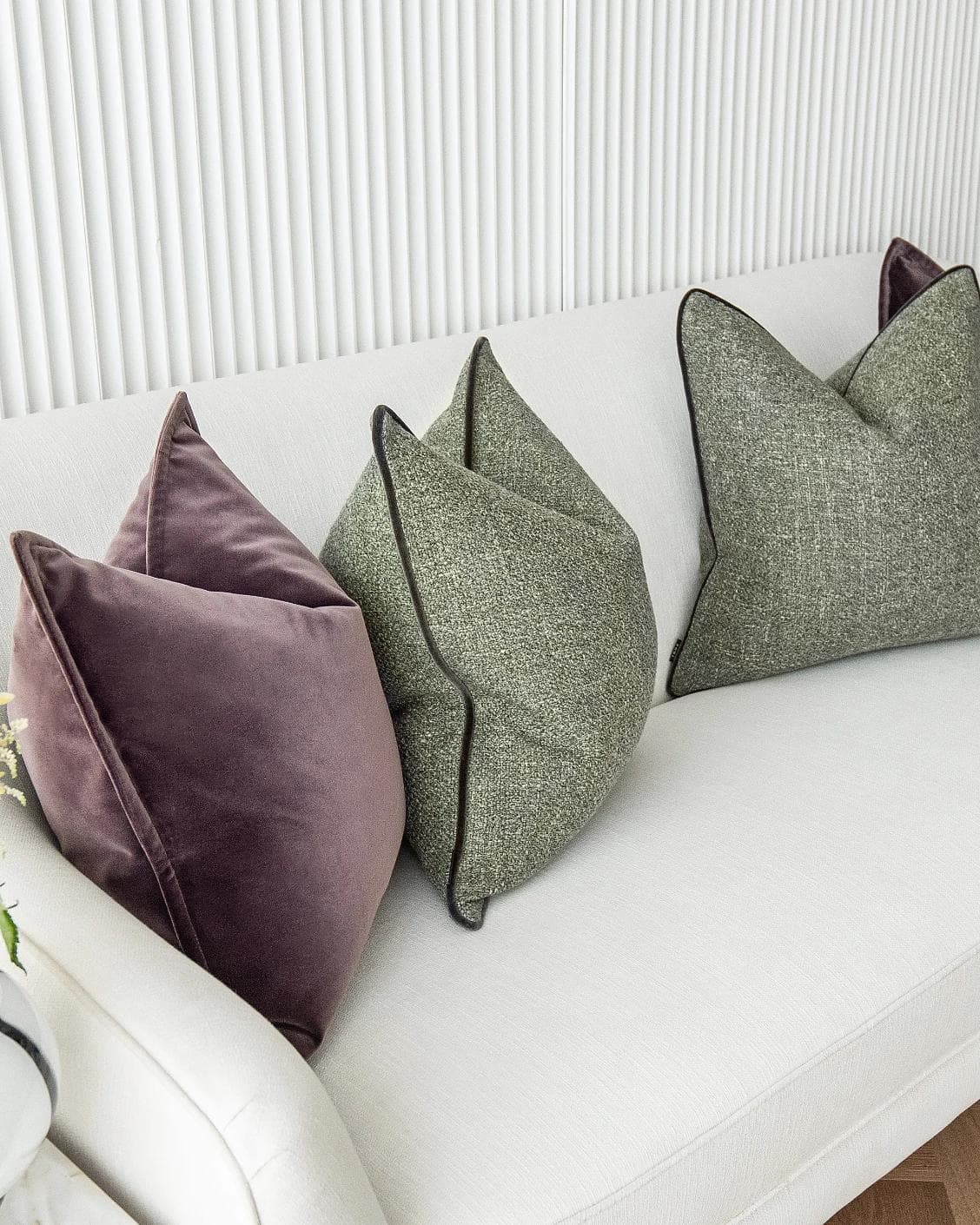 Kamelia Bundle cushion in purple and green, shown in a product left view as image 7