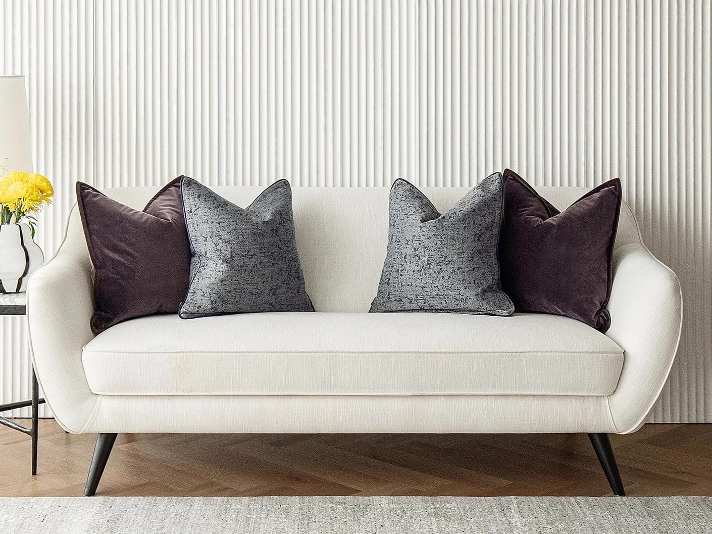 Lolanthe Bundle cushion in blue and purple, shown in a lifestyle front view as image 2