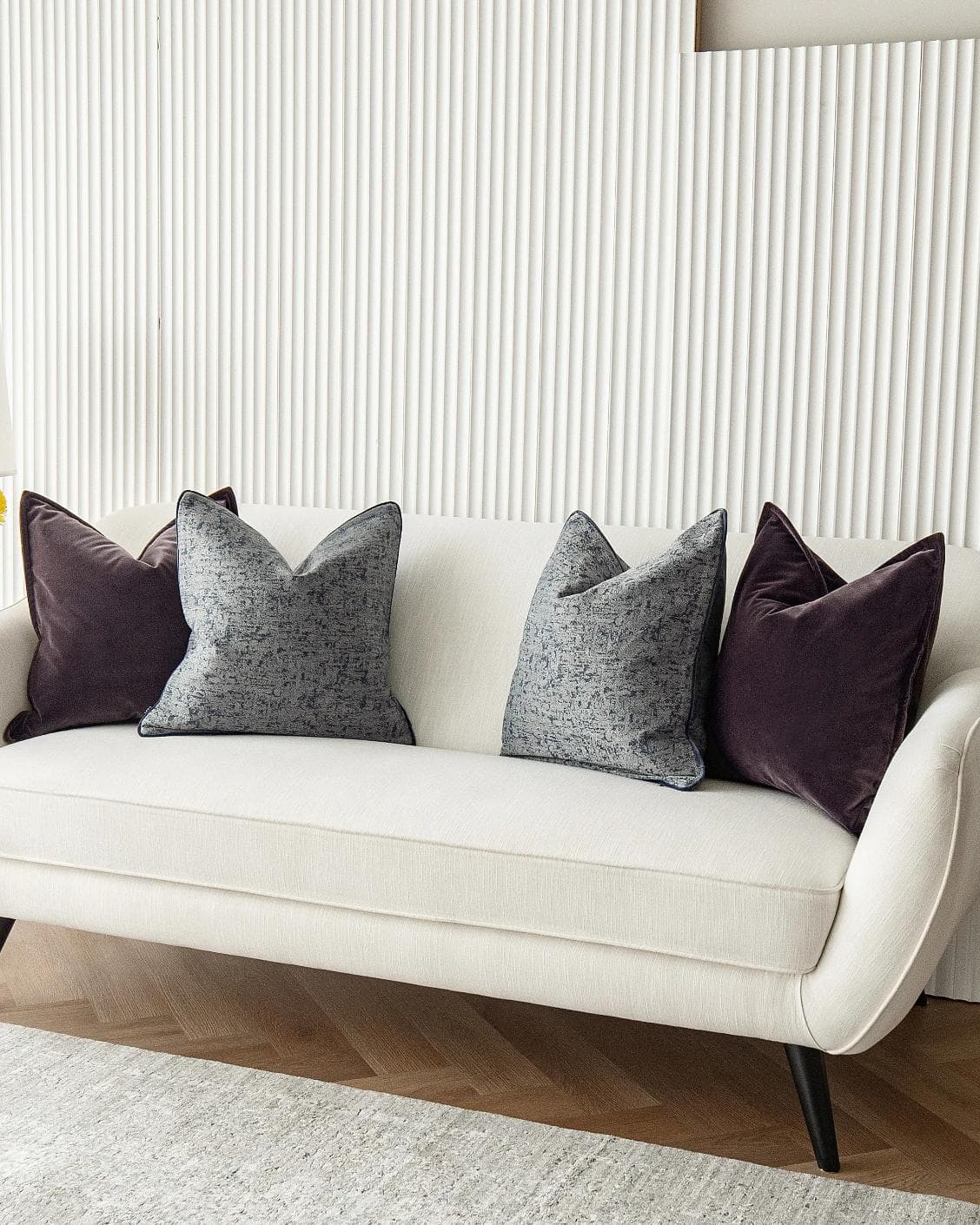 Lolanthe Bundle cushion in blue and purple, shown in a lifestyle right view as image 4