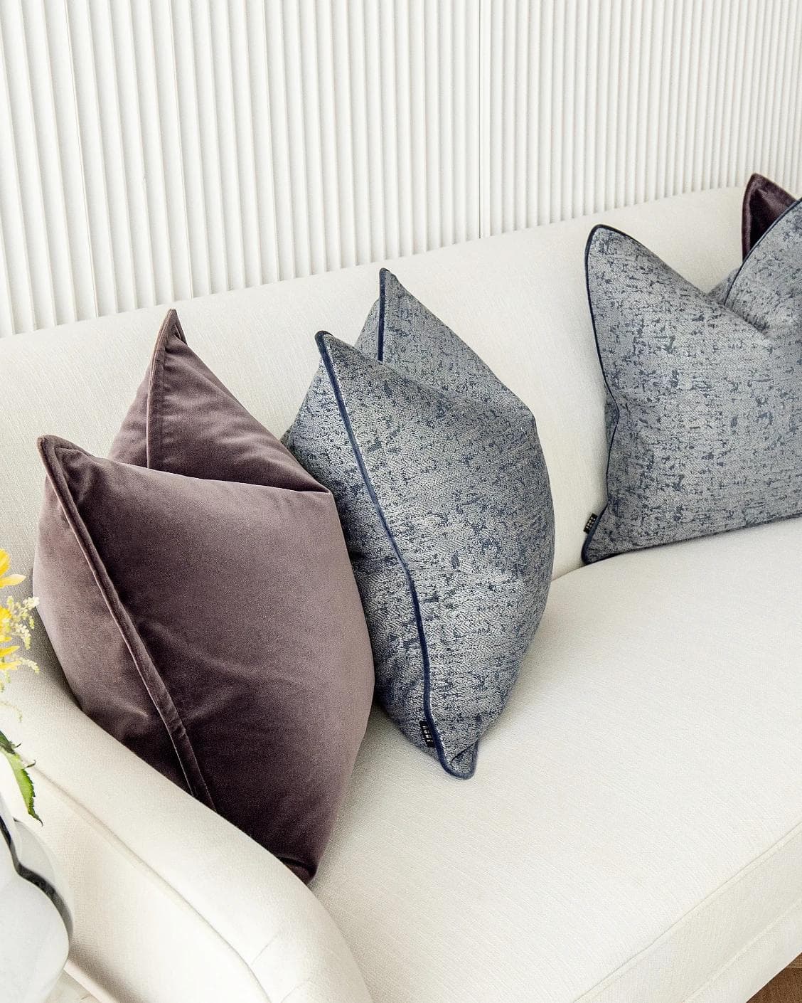 Lolanthe Bundle cushion in blue and purple, shown in a product left view as image 7