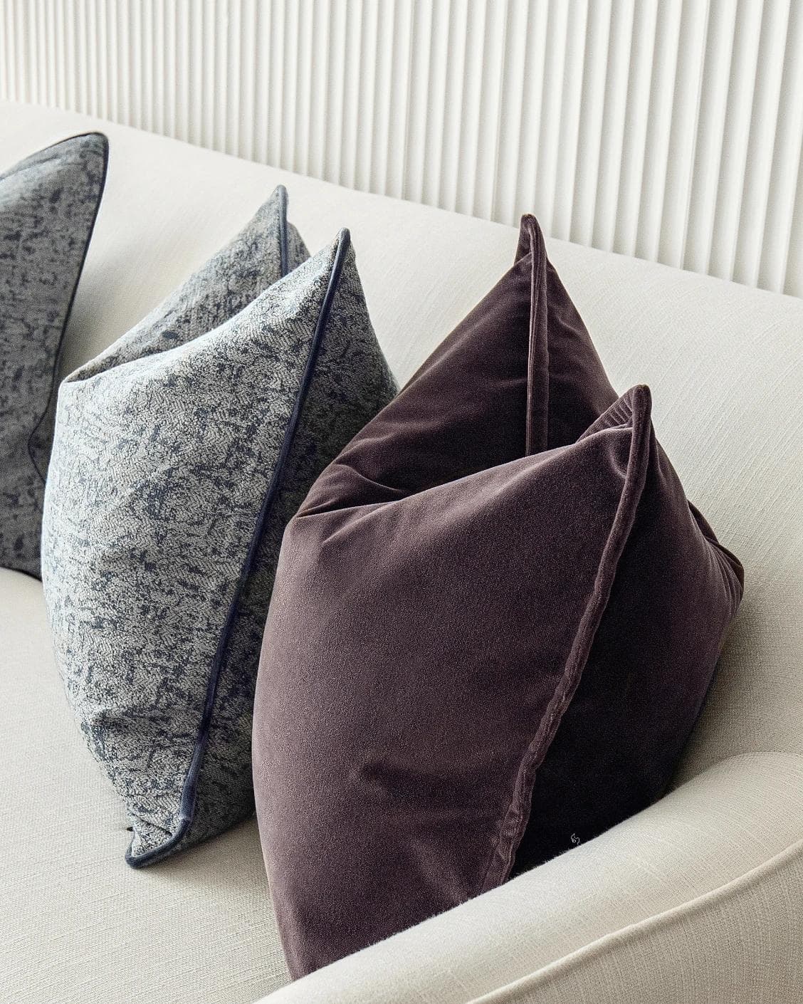 Lolanthe Bundle cushion in blue and purple, shown in a product right view as image 8