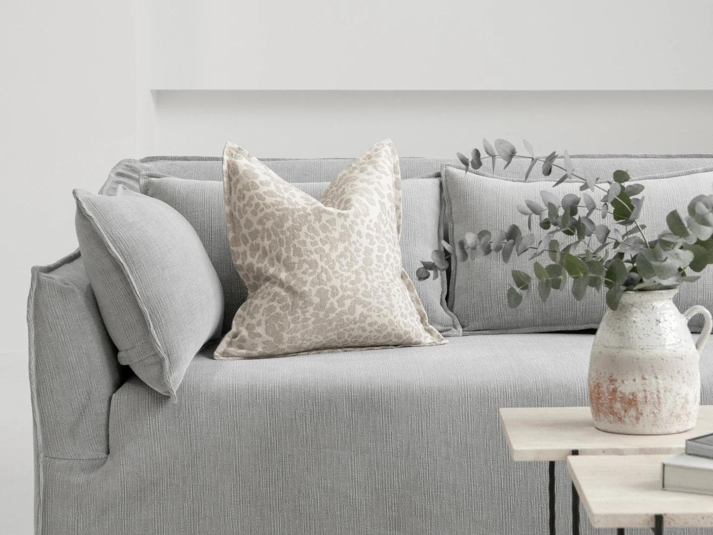 Val Klimt cushion in beige and ivory, shown in a lifestyle front view as image 4