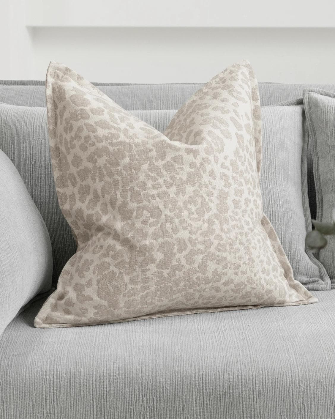 Val Klimt cushion in beige and ivory, shown in a lifestyle front view as image 2