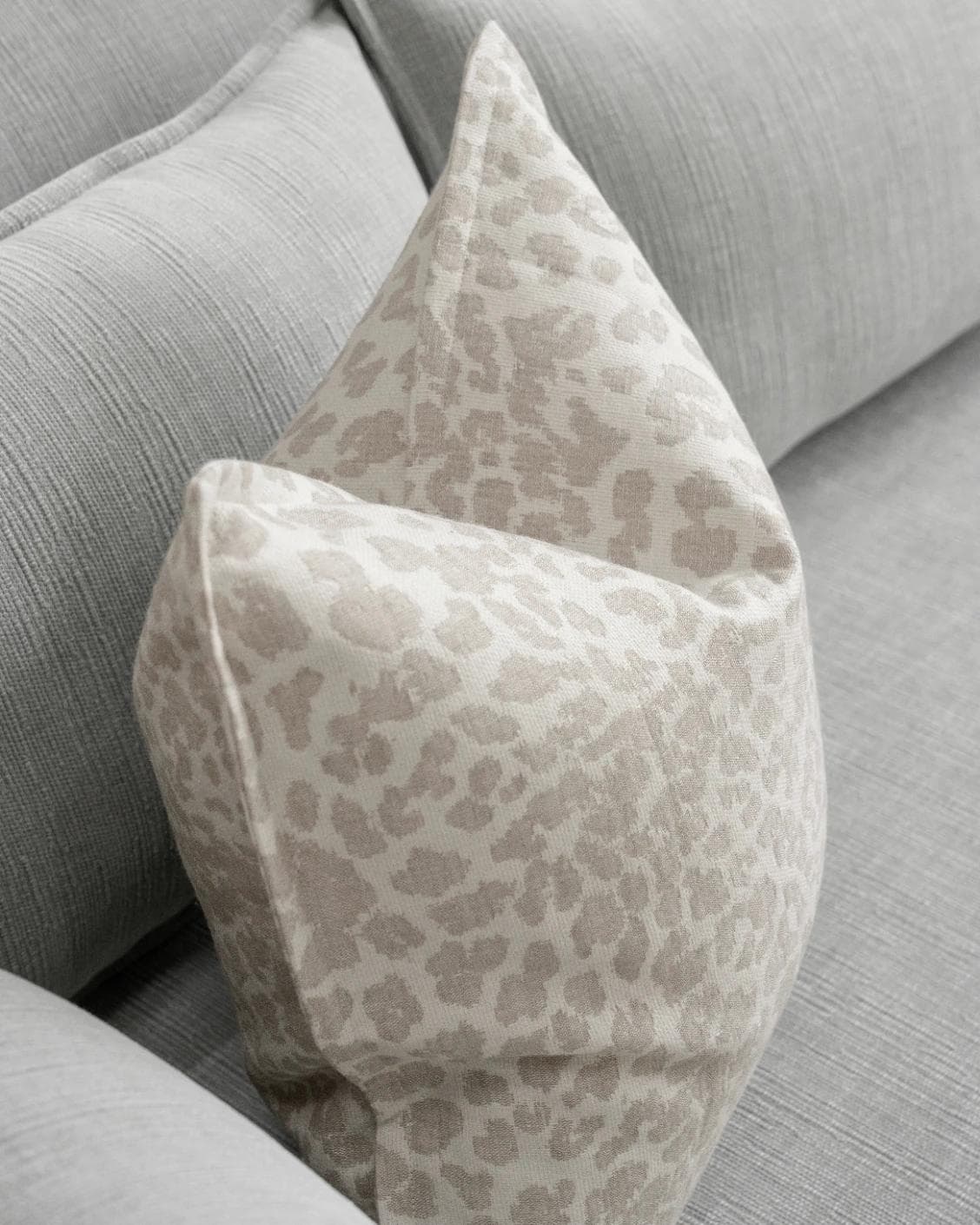 Val Klimt cushion in beige and ivory, shown in a lifestyle top view as image 5