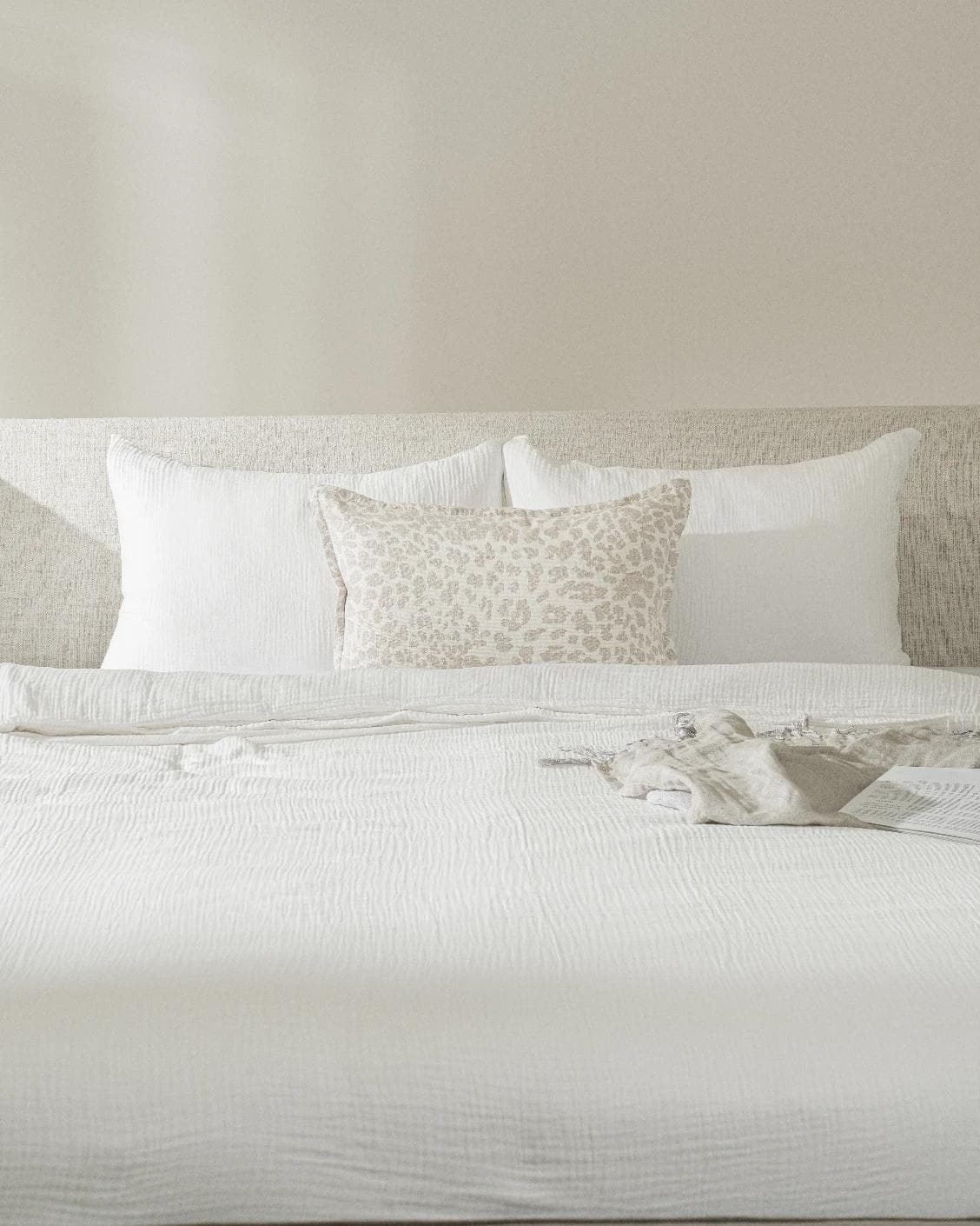Val Klimt III cushion in beige, shown in a lifestyle front view as image 2
