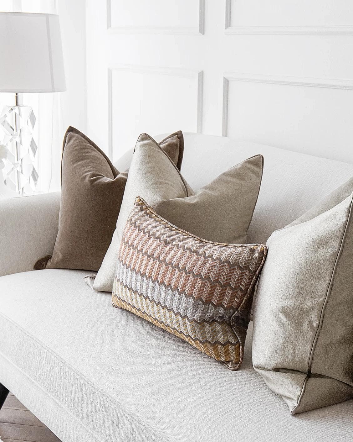 Eliana Bundle cushion in orange, shown in a lifestyle right view as image 4