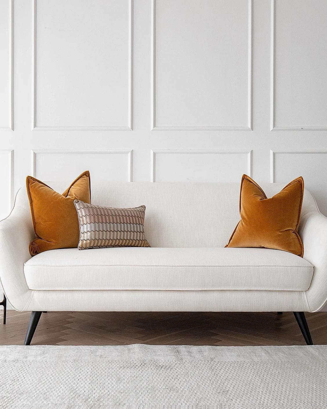 Ellie Bundle cushion in orange and yellow, shown in a lifestyle front view as image 4