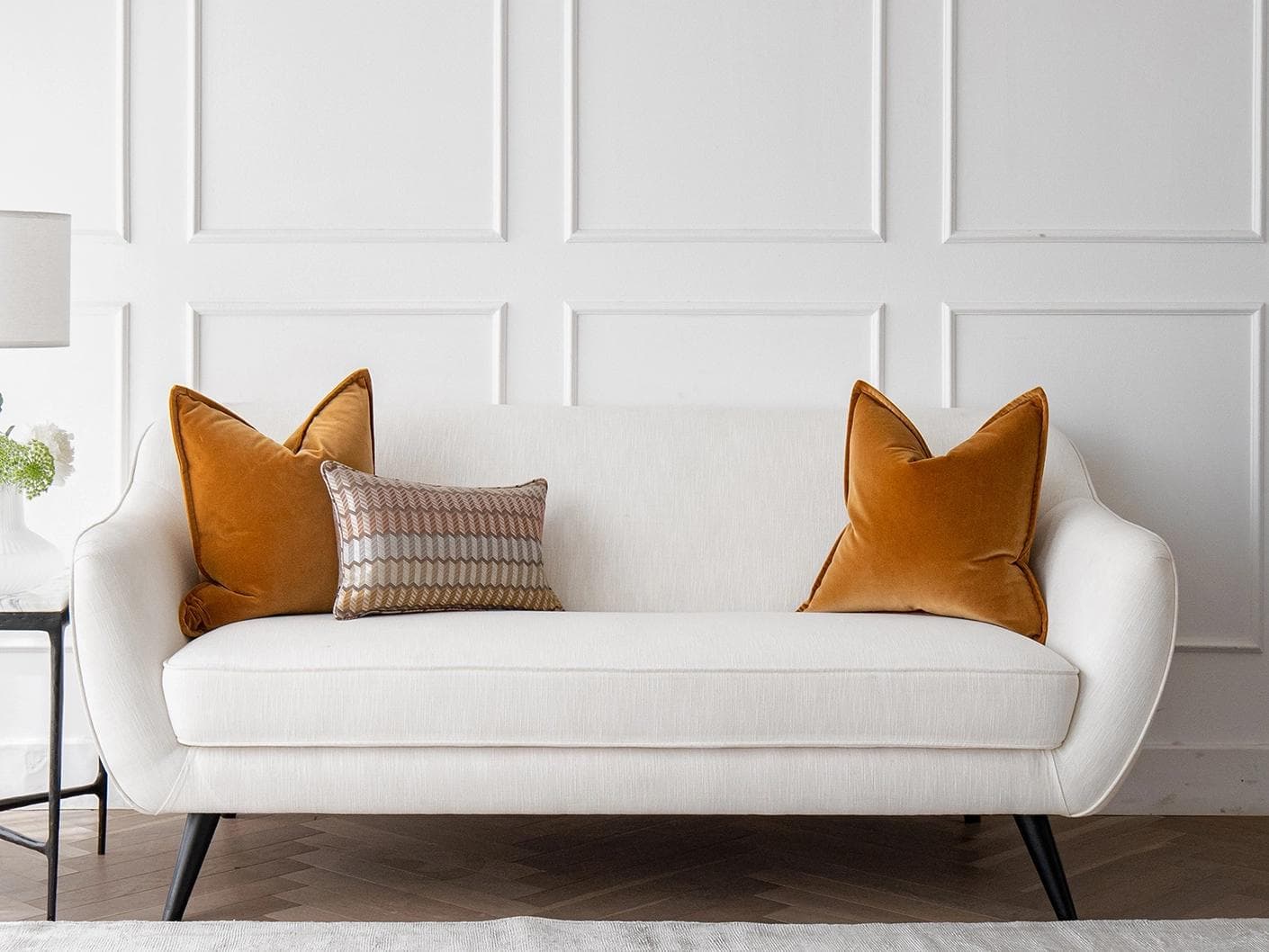 Ellie Bundle cushion in orange and yellow, shown in a lifestyle front view as image 4