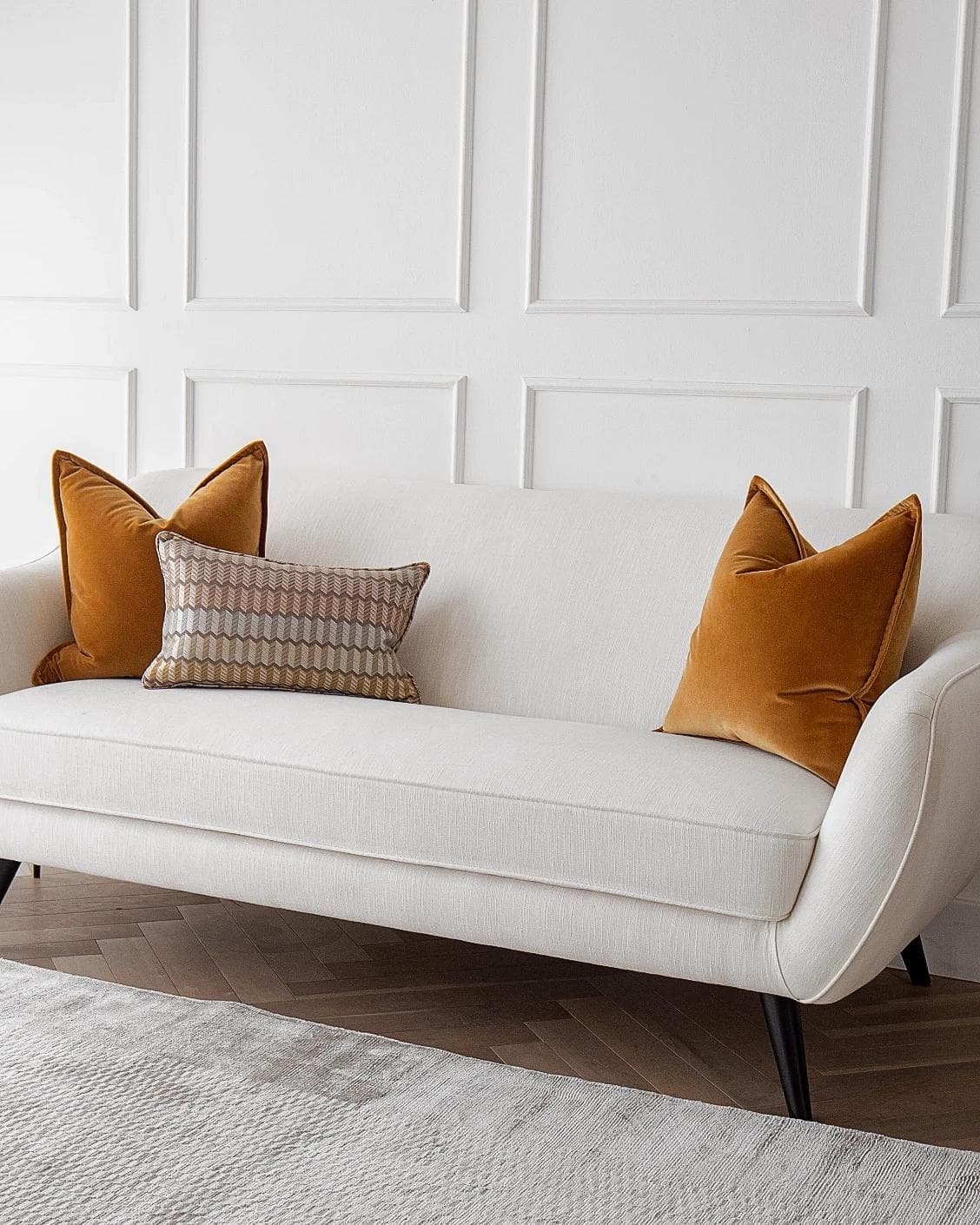 Ellie Bundle cushion in orange and yellow, shown in a lifestyle right view as image 2