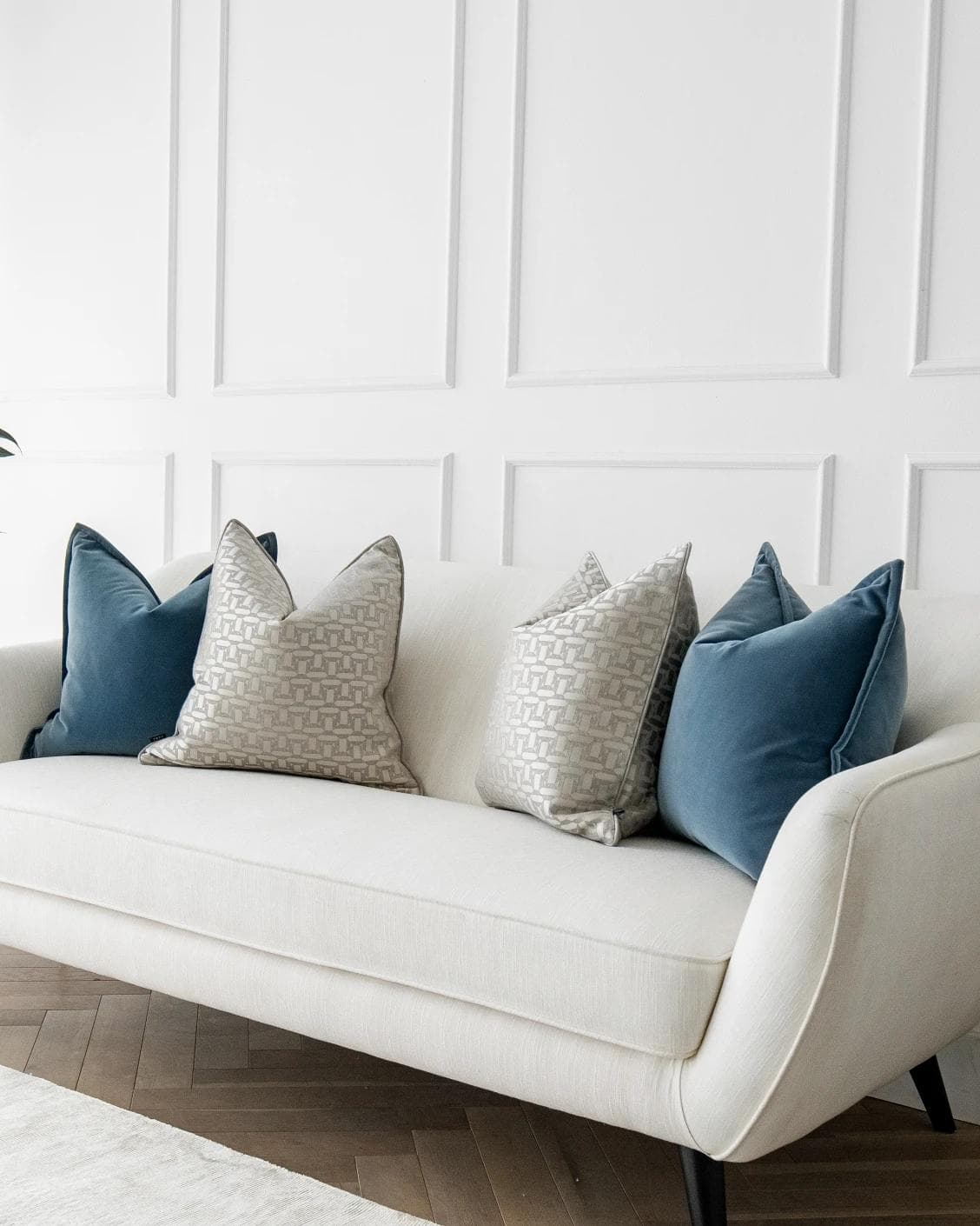 Myra Bundle cushion in blue, beige and silver, shown in a lifestyle right view as image 2