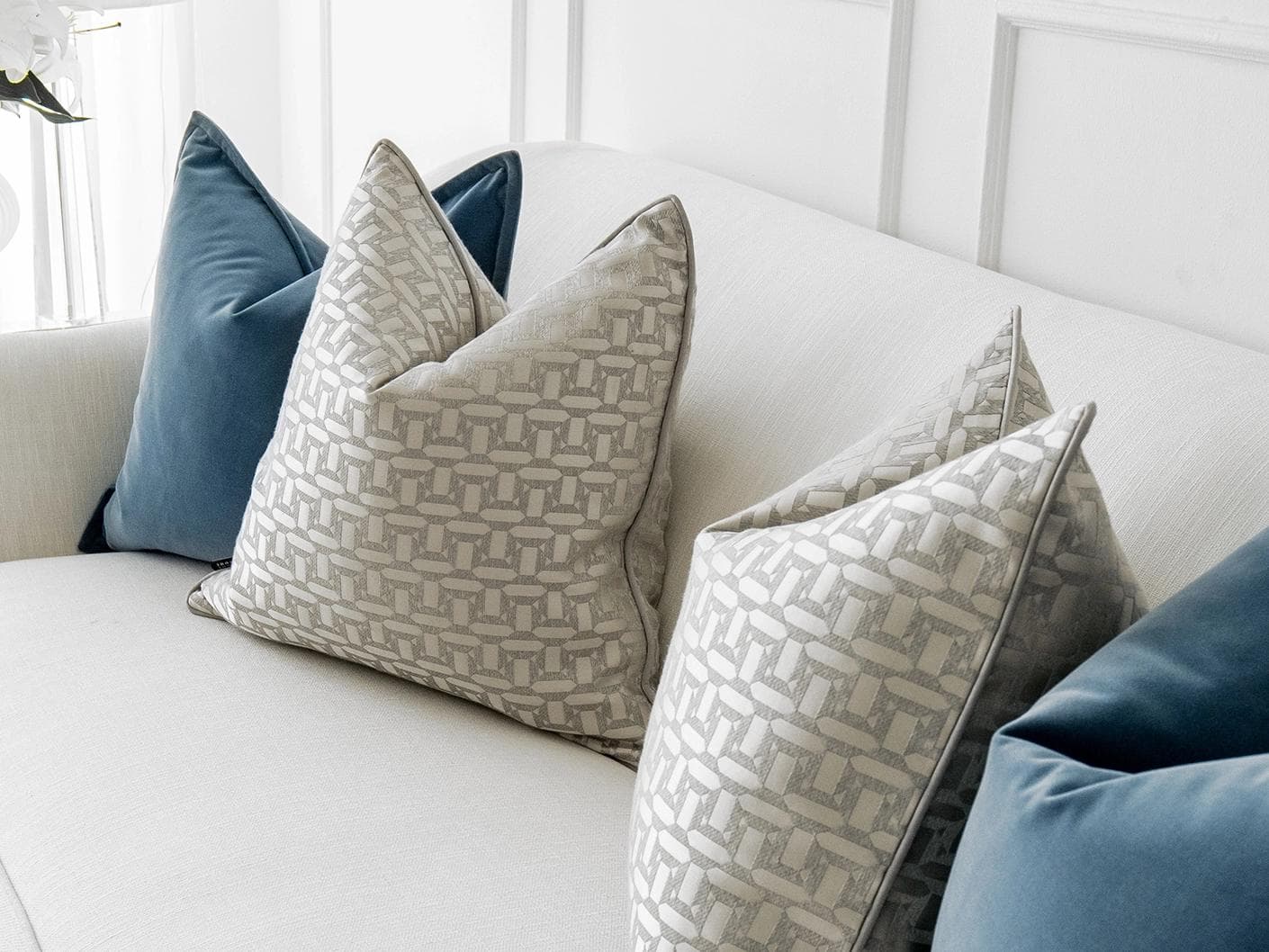 Myra Bundle cushion in blue, beige and silver, shown in a lifestyle right view as image 5