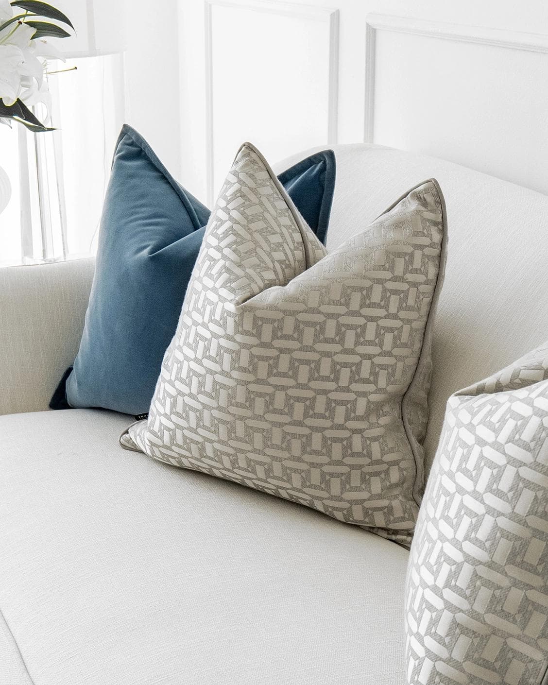 Myra Bundle cushion in blue, beige and silver, shown in a lifestyle right view as image 5