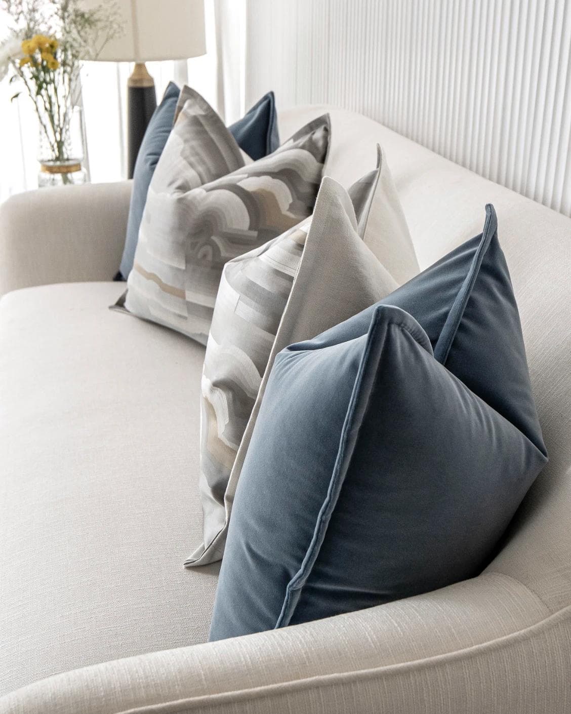 Guadalupe Bundle cushion in blue and grey, shown in a lifestyle right view as image 11