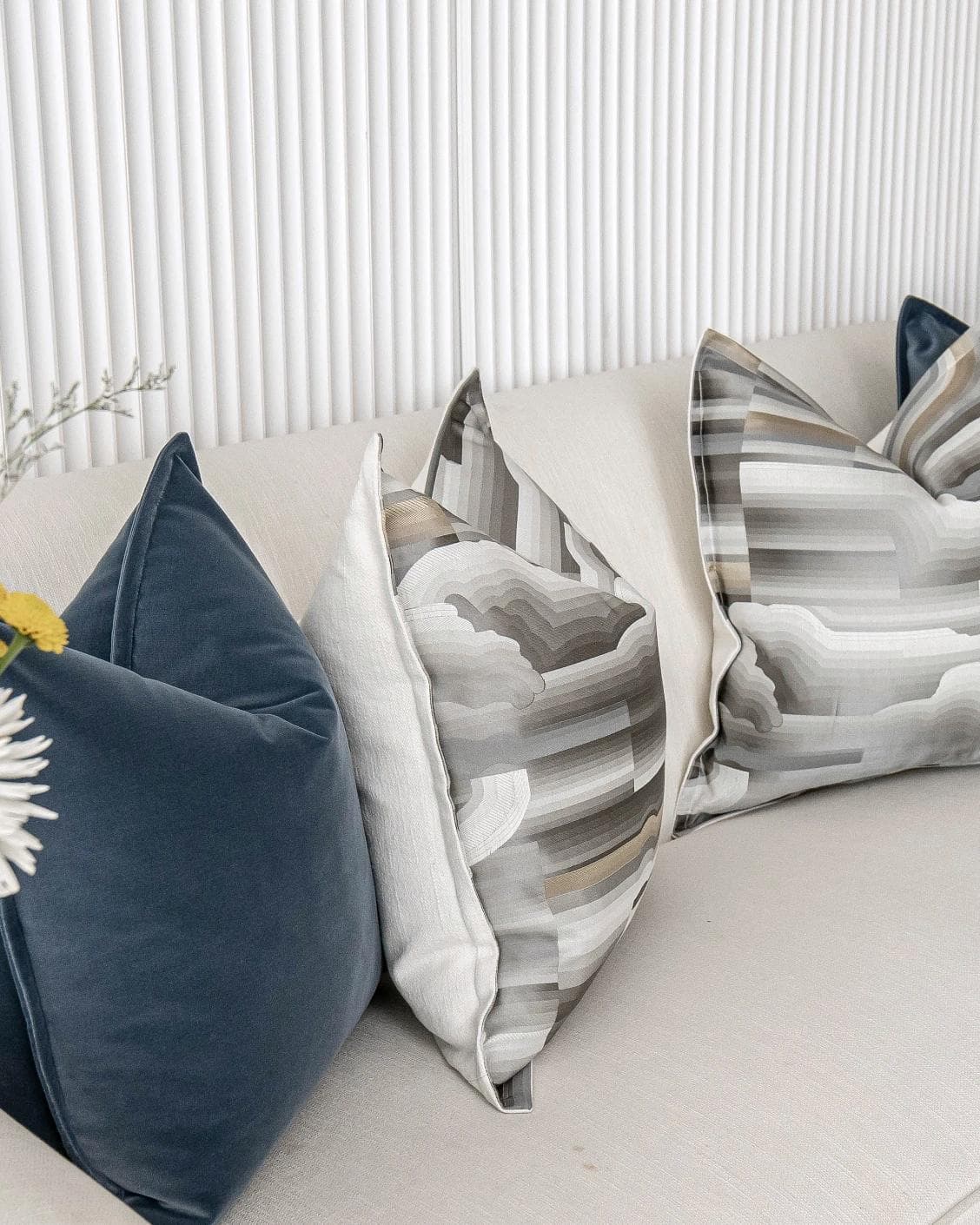 Guadalupe Bundle cushion in blue and grey, shown in a product left view as image 12