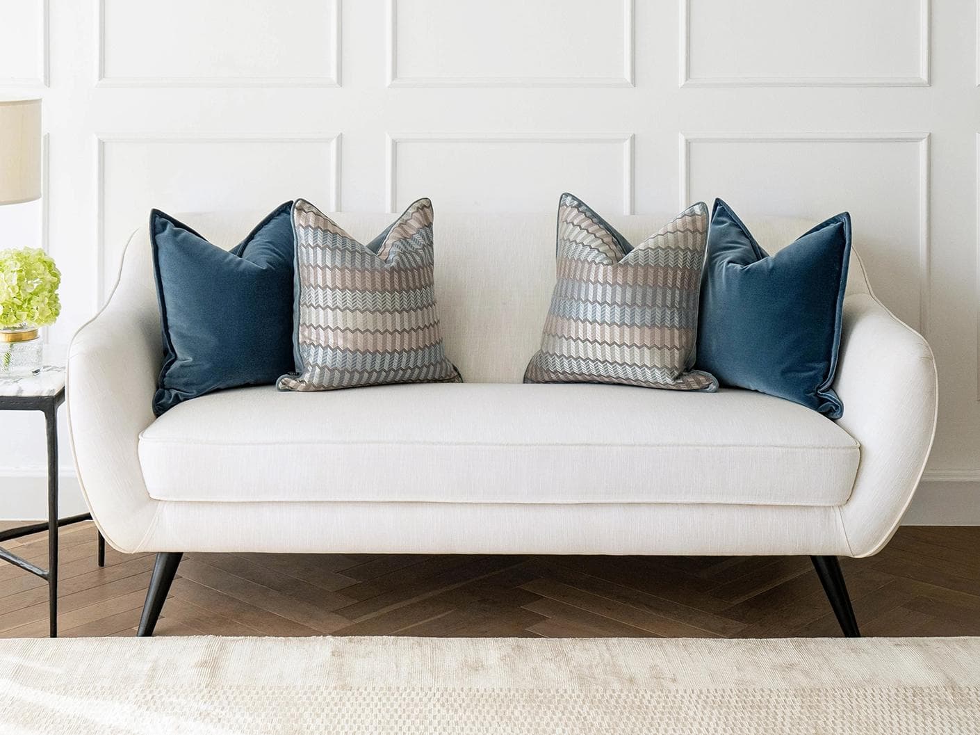 Ivy Bundle cushion in blue and silver, shown in a lifestyle front view as image 4