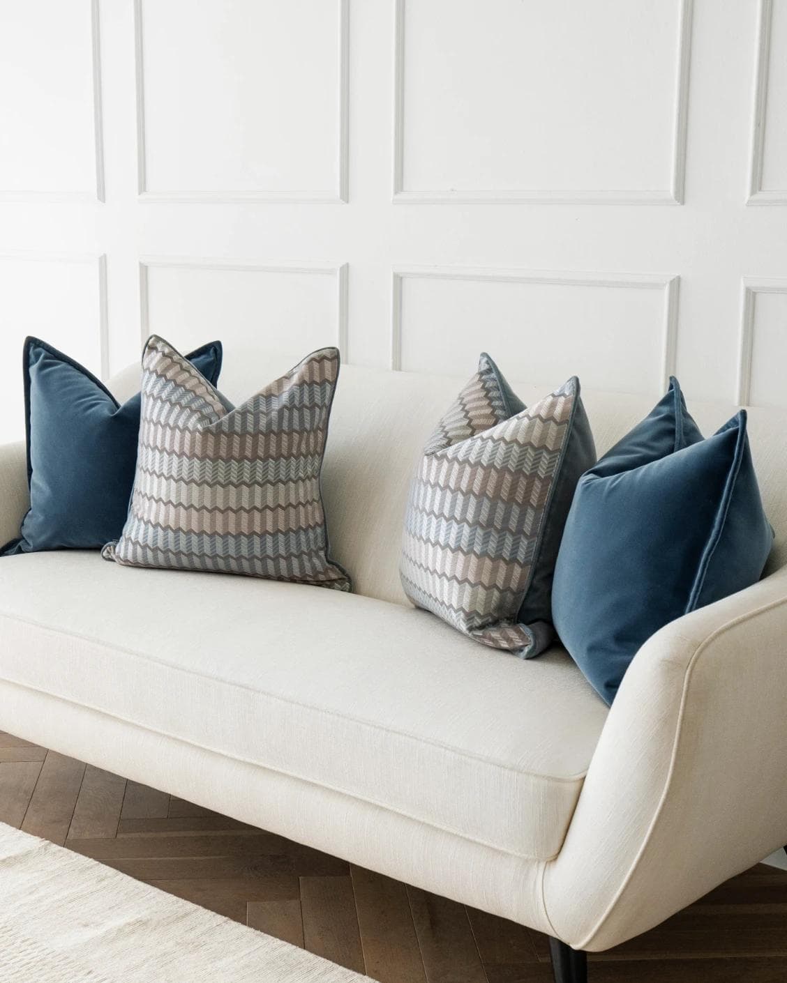Ivy Bundle cushion in blue and silver, shown in a lifestyle right view as image 2