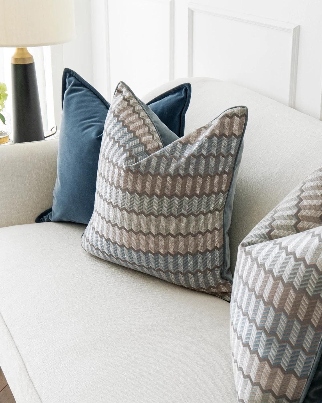 Ivy Bundle cushion in blue and silver, shown in a lifestyle right view as image 5