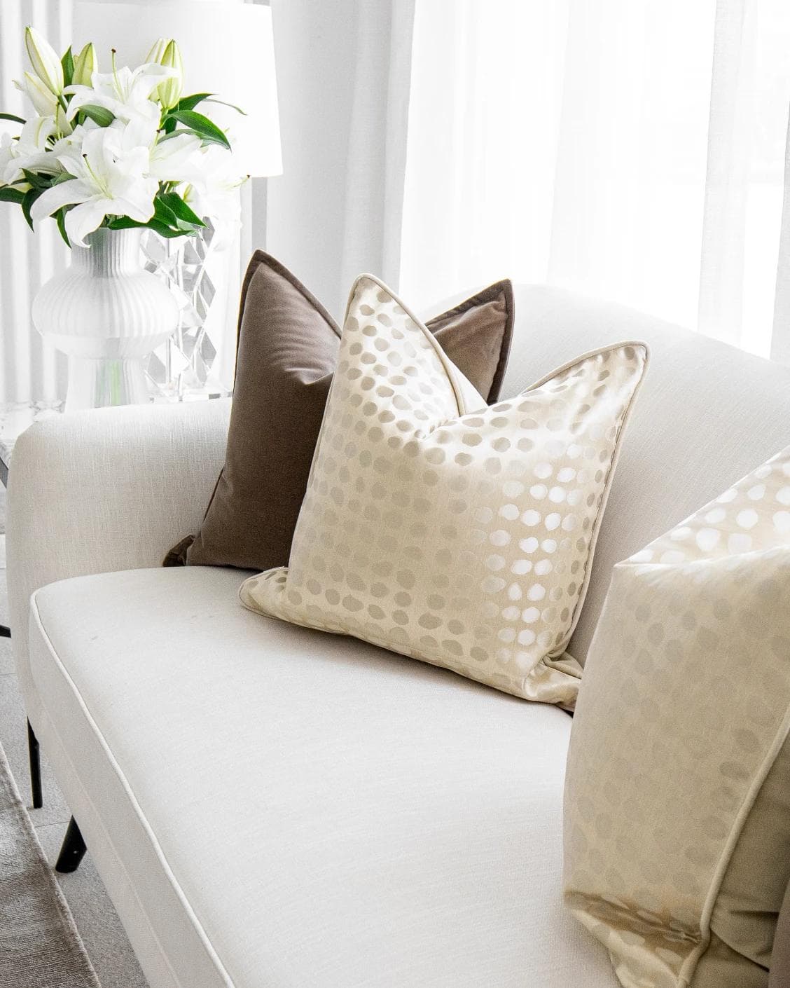 Flora Bundle cushion in brown, beige and gold, shown in a lifestyle right view as image 4