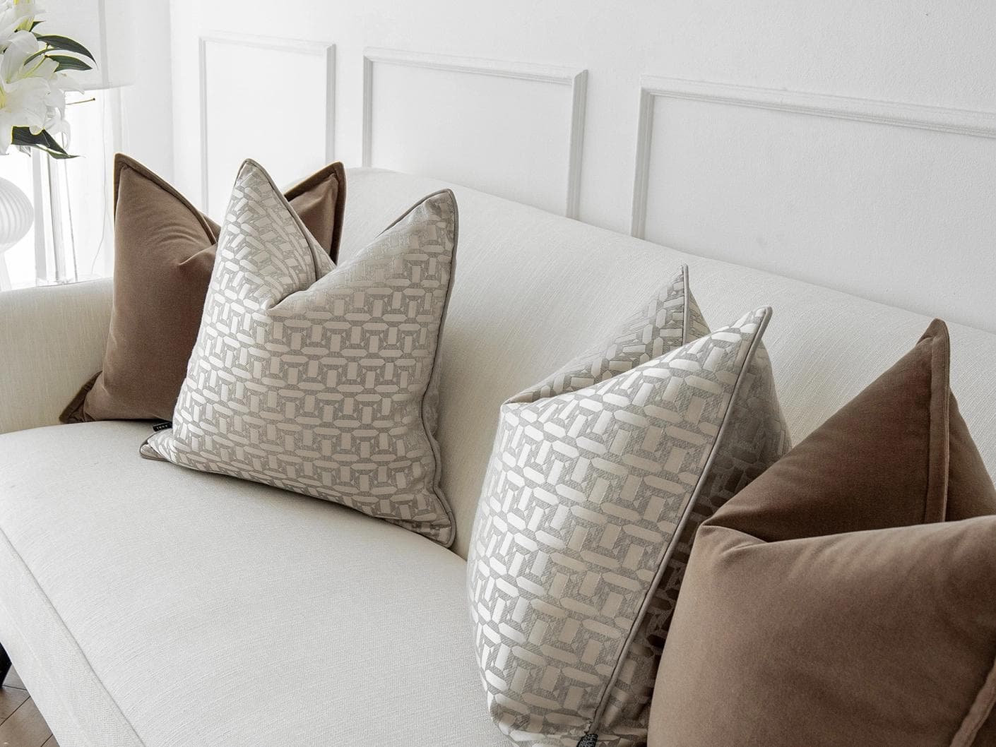 Elsie Bundle cushion in brown, beige and silver, shown in a lifestyle right view as image 5