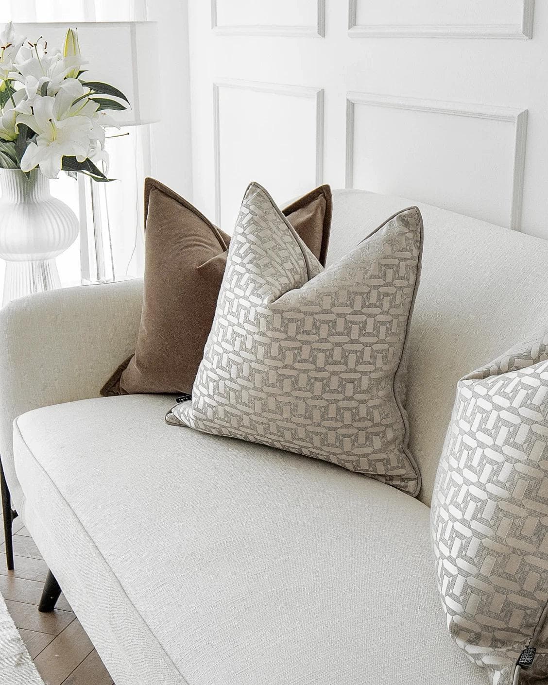 Elsie Bundle cushion in brown, beige and silver, shown in a lifestyle right view as image 5