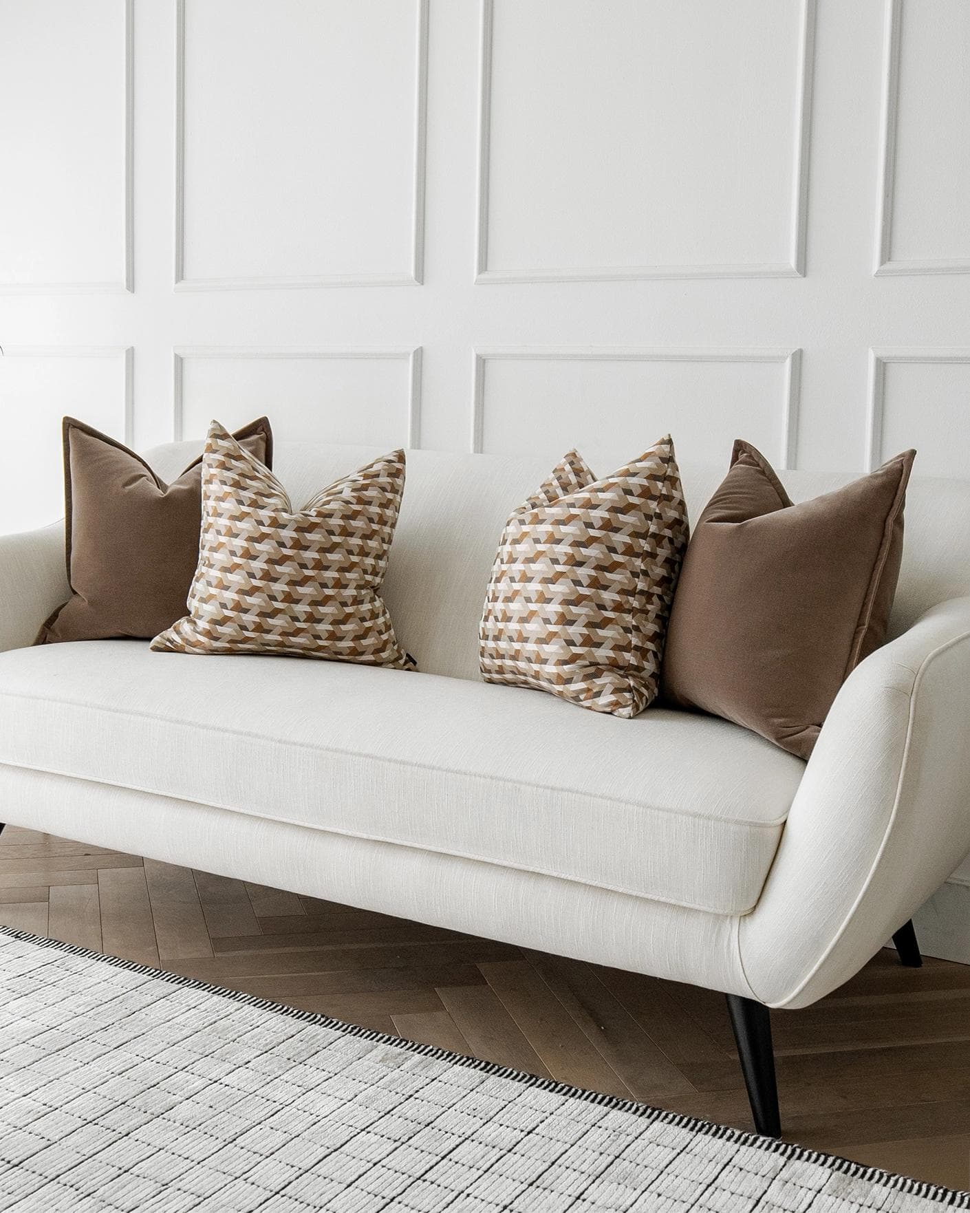 Marilyn Bundle cushion in brown, orange and beige, shown in a lifestyle right view as image 2