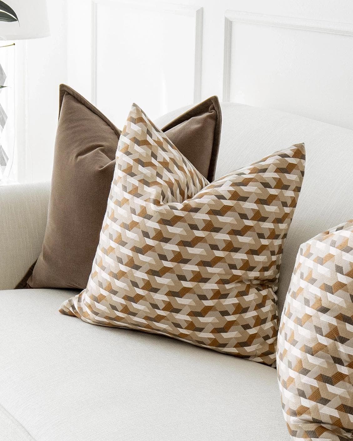 Marilyn Bundle cushion in brown, orange and beige, shown in a lifestyle right view as image 4