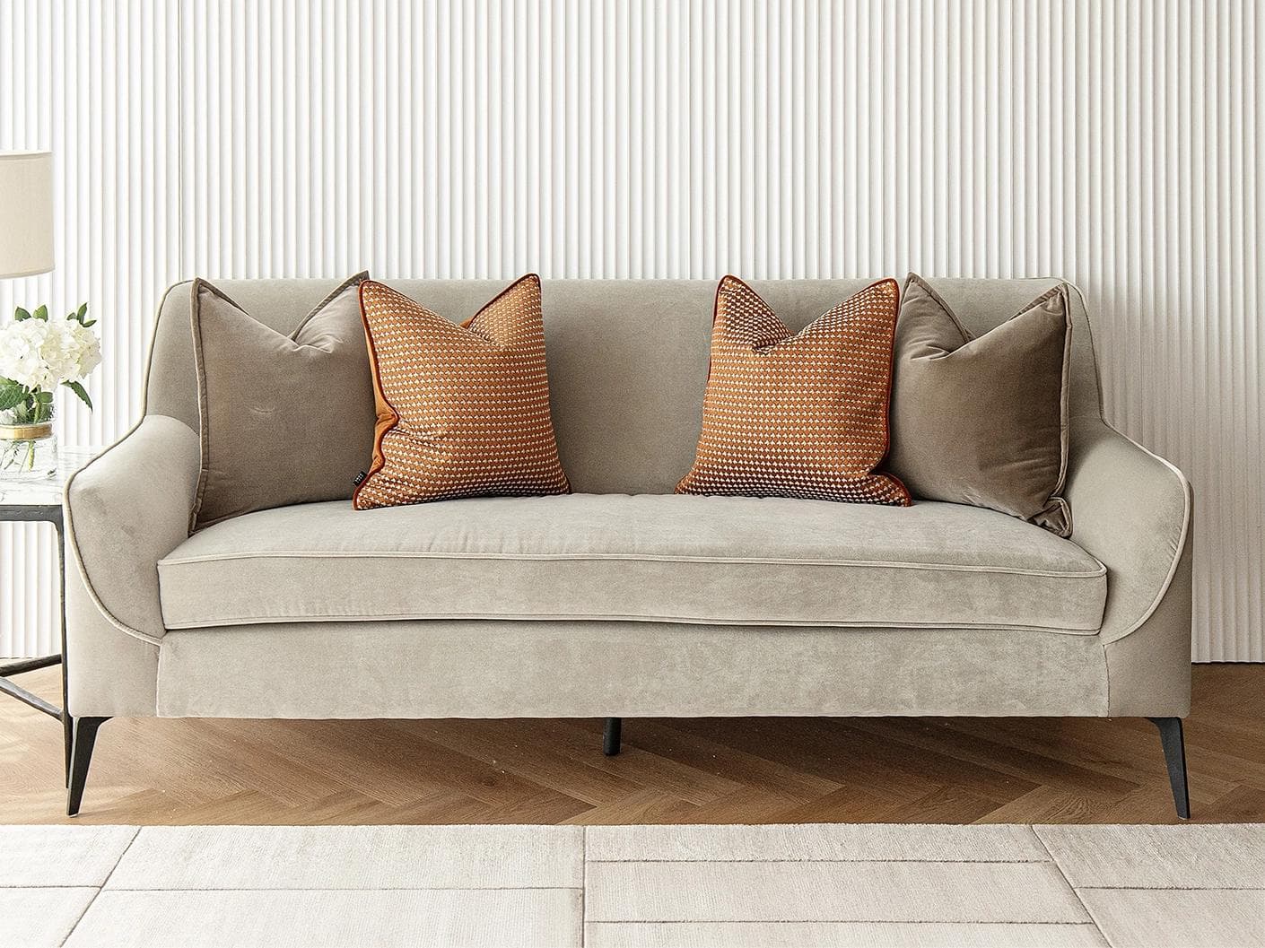 Kalysta Bundle cushion in brown and orange, shown in a lifestyle front view as image 4